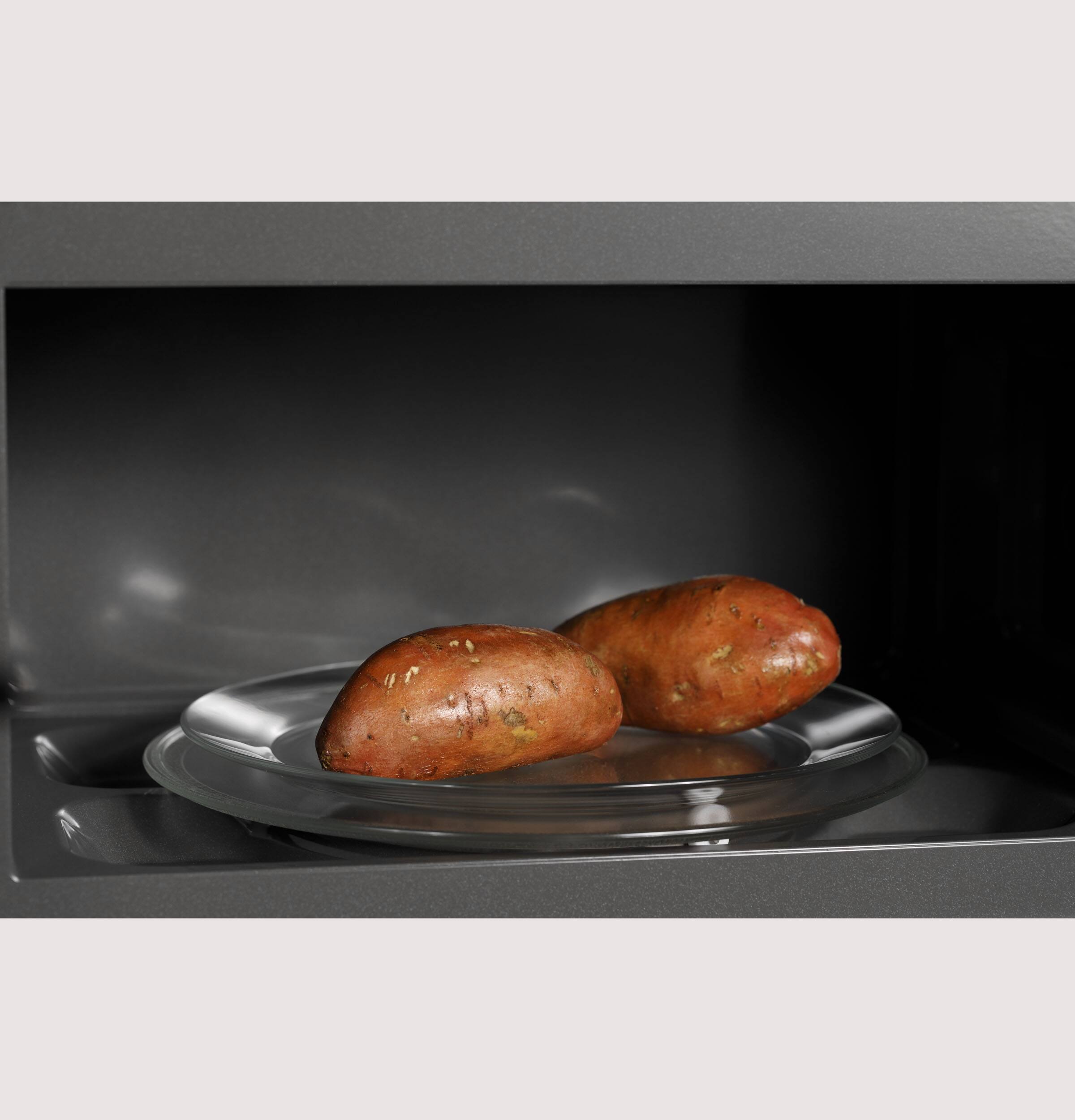 Alt View 8. GE Profile - 2.1 Cu. Ft. Over-the-Range Microwave with Sensor Cooking and Easy Clean Interior with Steam Clean - Stainless Steel.