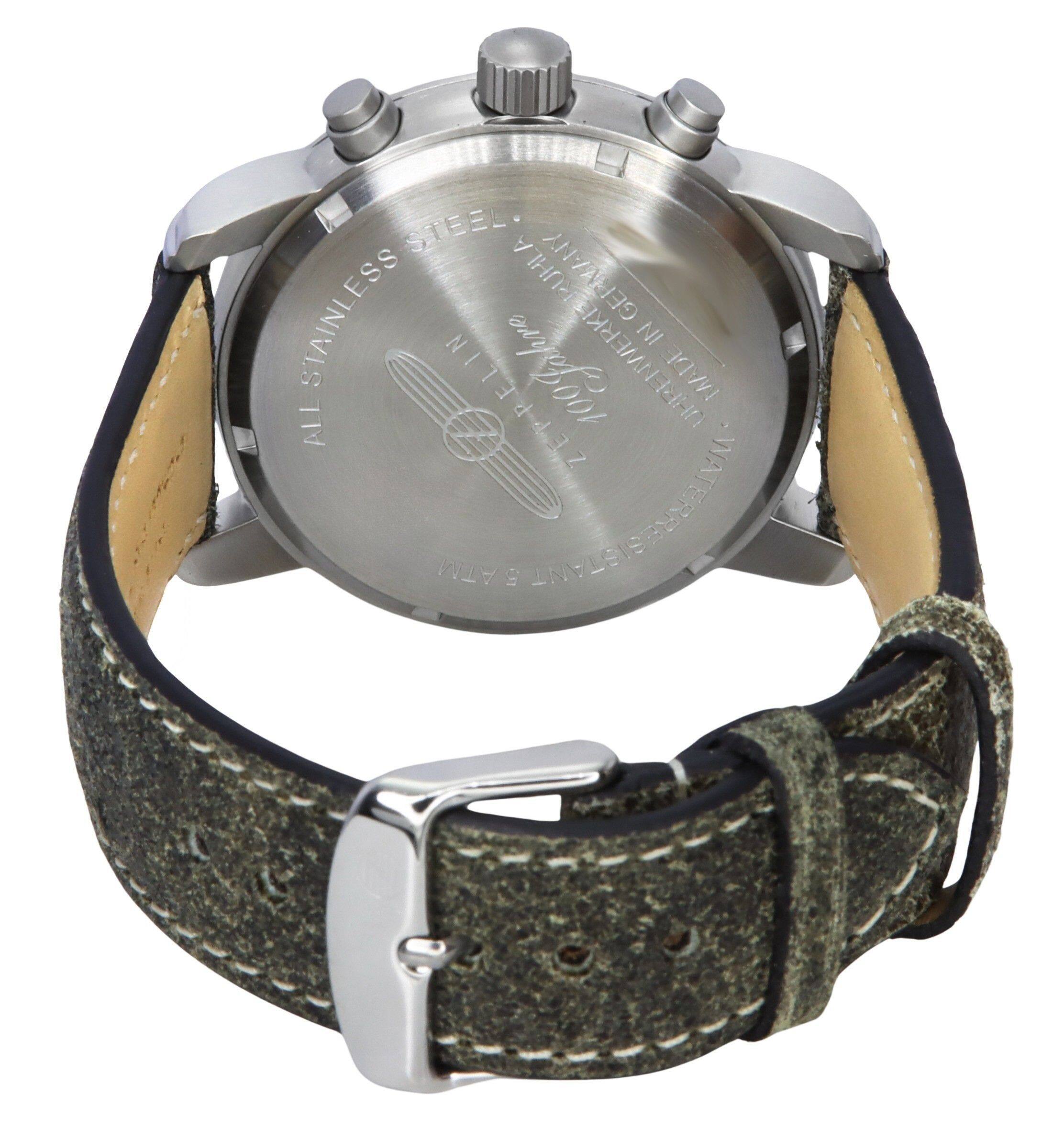 STEEL PUHLA GEEMANY STAINLESS 100Jabre NI IAM ALL ZEPPELIN ATM S ANFLSISEMEEINI

Corrected text from the image:
ALL STAINLESS STEEL
MADE IN GERMANY
WATER RESISTANT
100M
ZEPPELIN
1972