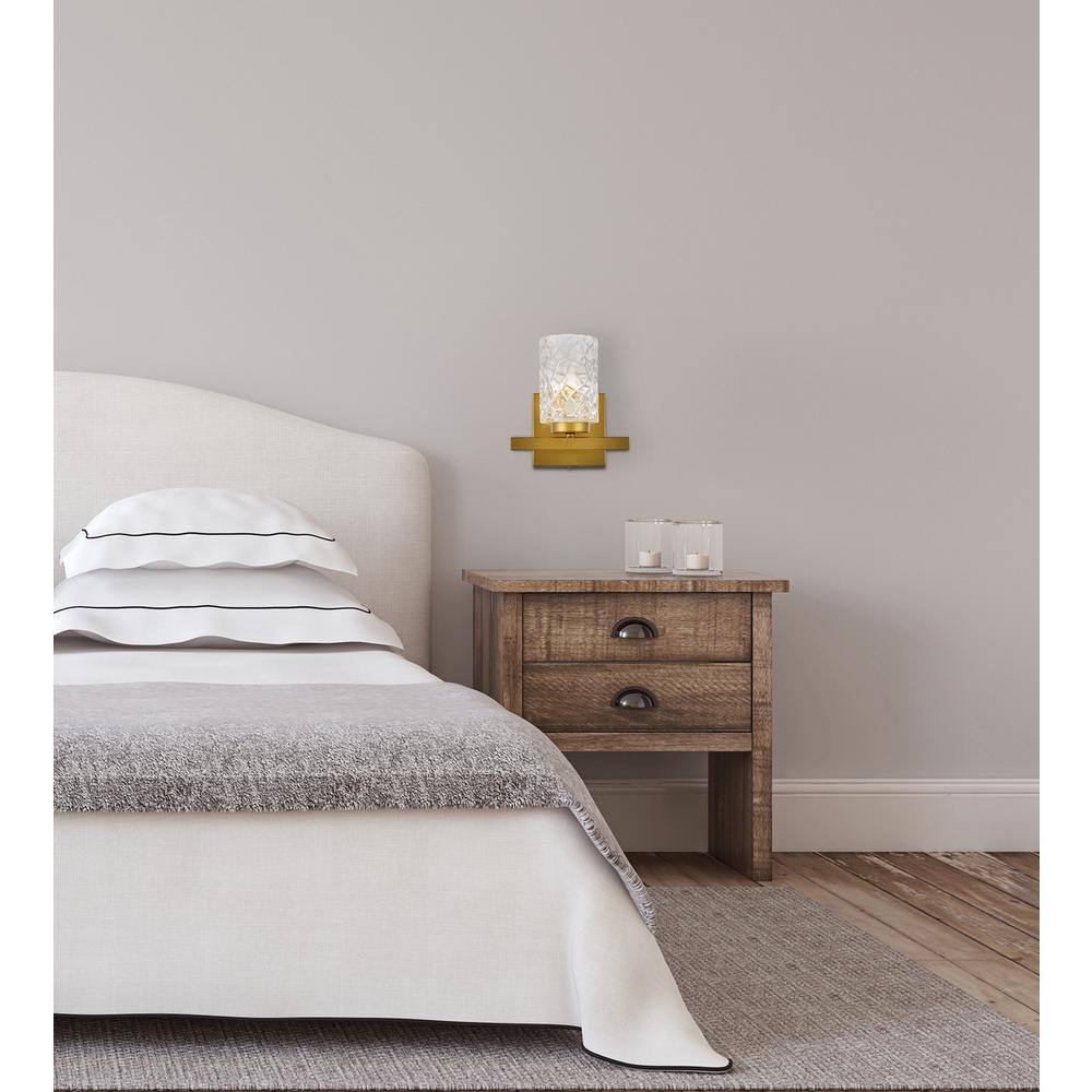 Angle. Living District - Cassie 1 light bath sconce in brass with clear shade - Brass And Clear Shade.