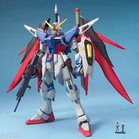 Left. Bandai - Mobile Suit Gundam MG 1/100 ZGMF-X42S Destiny Gundam.