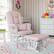 Left. Storkcraft - Tuscany Glider and Ottoman - White/Pink Swirl.