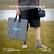 The text on the image is grouped and corrected as follows:
"Portable with Carrying Bag RENOGY folded size 24.8*17.1*1 in lightweight 7.3 lb."