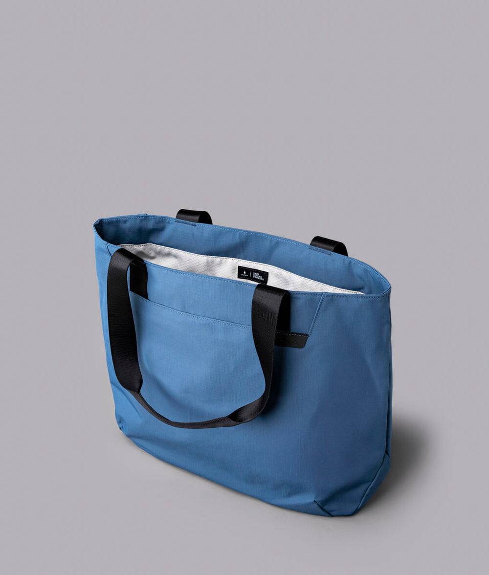 Alt View 2. ALPAKA - Elements Tote 20L Laptop Tote Bag with Padded 16" Sleeve,Open Top with Magnetic Closure - Blue Axoflux 210D.