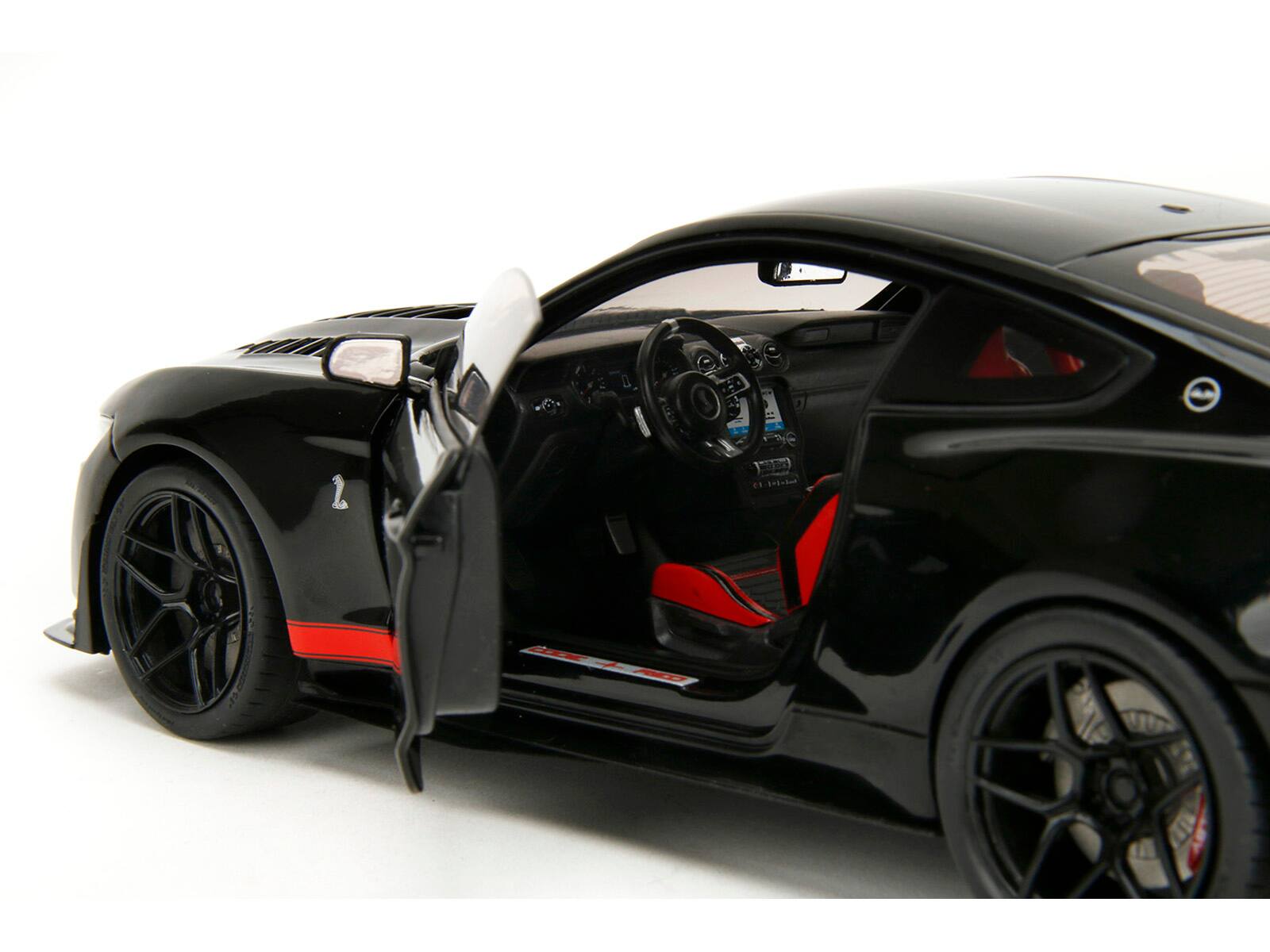 Left. Jada - Shelby GT500 "Code Red" Black with Red Stripes "Pink Slips" Series 1/18 Diecast Model Car by Jada - Black.