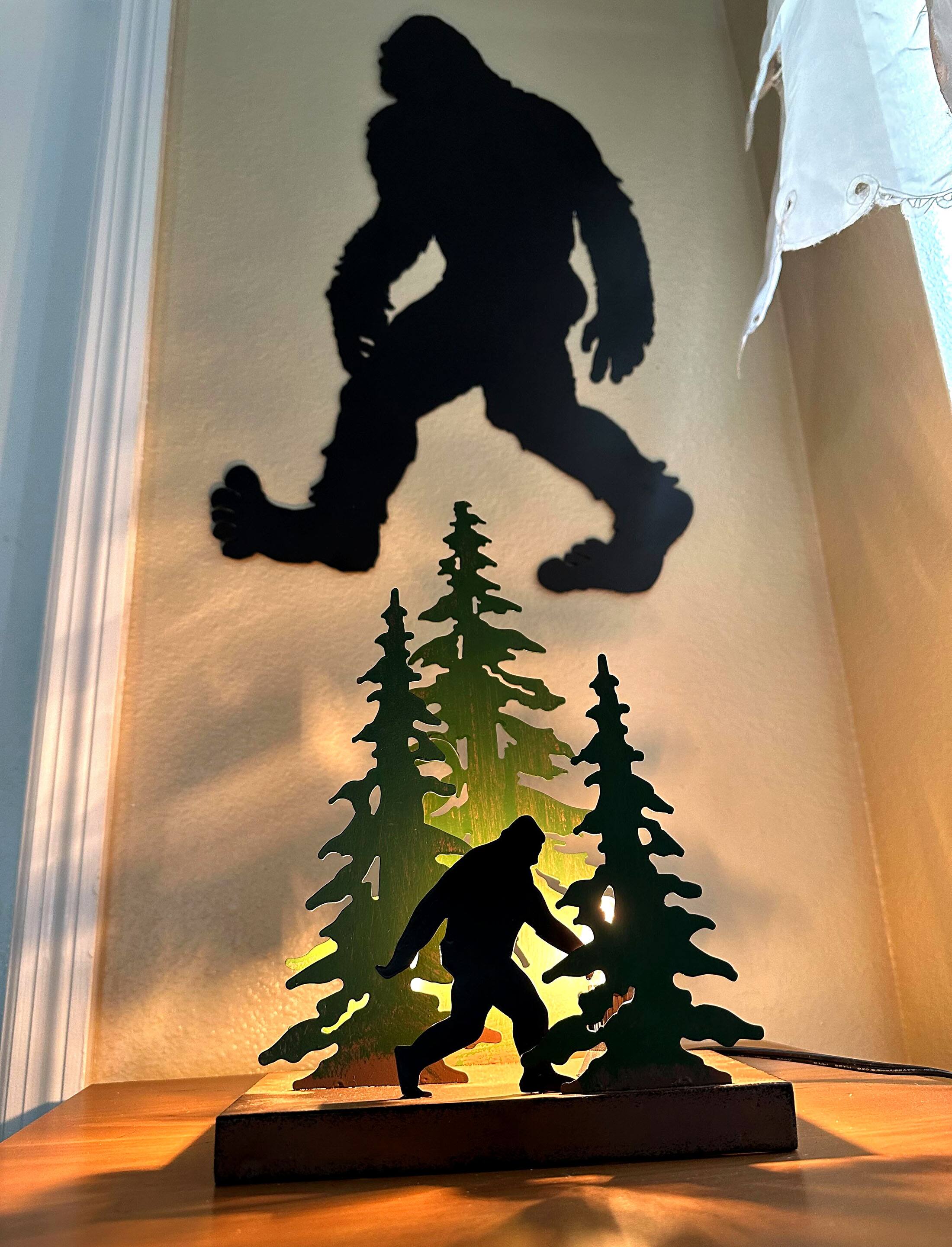 Alt View 4. Zeckos - Black Metal Laser Cut Bigfoot Walking Wall Sculpture Home Decor Sasquatch Art - Black.