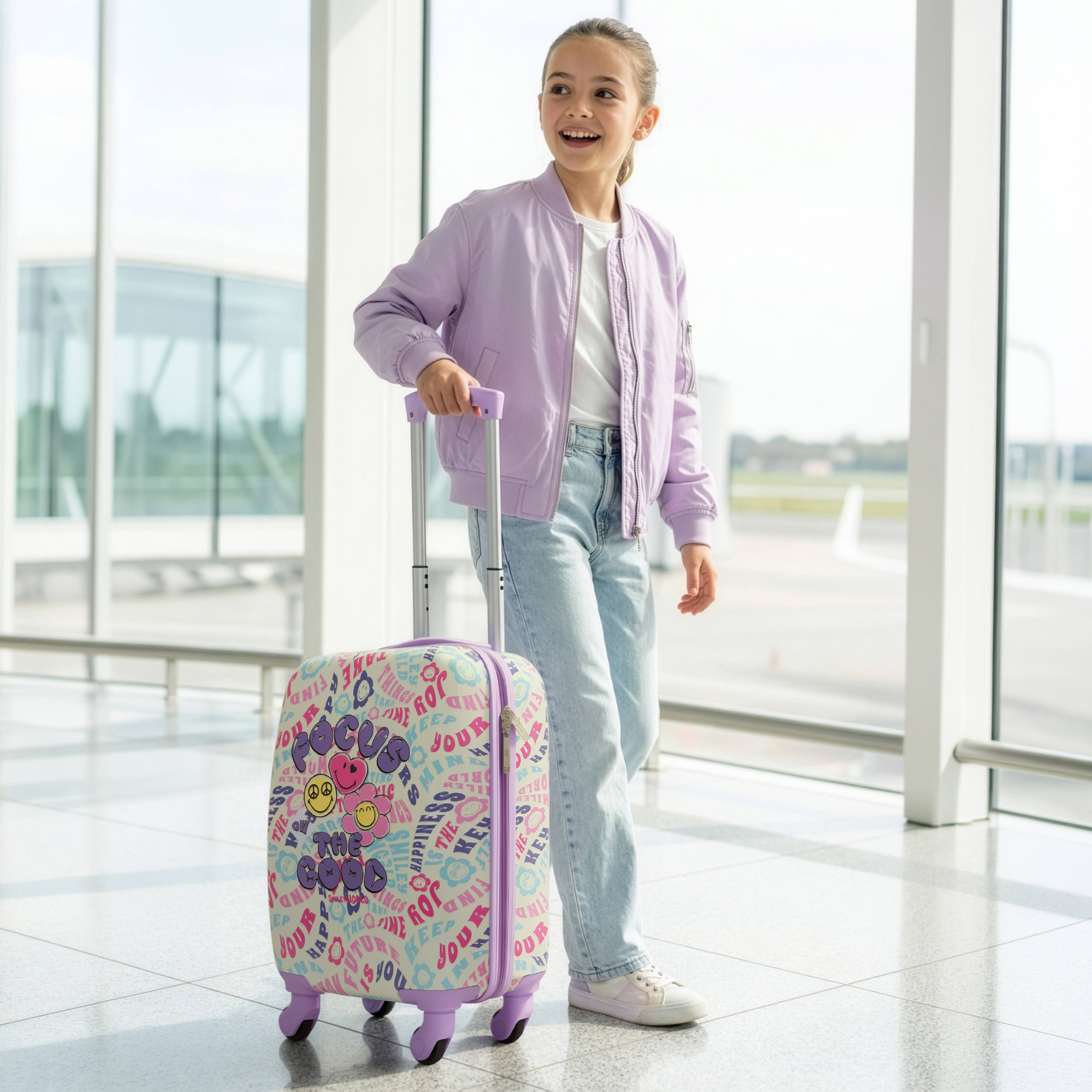 The text on the suitcase reads:

"THE GOOD
THE HAPPY
THE KEY
THE JOURNEY
THE FOCUS
THE ROSE
THE KEY
THE JOURNEY
THE ROSE
THE KEY
THE JOURNEY
THE ROSE
THE KEY
THE JOURNEY
THE ROSE
THE KEY
THE JOURNEY
THE ROSE
THE KEY
THE JOURNEY
THE ROSE
THE KEY
THE JOURNEY
THE ROSE
THE KEY
THE JOURNEY
THE ROSE
THE KEY
THE JOURNEY
THE ROSE
THE KEY
THE JOURNEY
THE ROSE
THE KEY
THE JOURNEY
THE ROSE
THE KEY
THE JOURNEY
THE ROSE
THE KEY
THE JOURNEY
THE ROSE
THE KEY
THE JOURNEY
THE ROSE
THE KEY
THE JOURNEY
THE ROSE
THE KEY
THE JOURNEY
THE ROSE
THE KEY
THE JOURNEY
THE ROSE
THE KEY
THE JOURNEY
THE ROSE
THE KEY
THE JOURNEY
THE ROSE
THE KEY
THE JOURNEY
THE