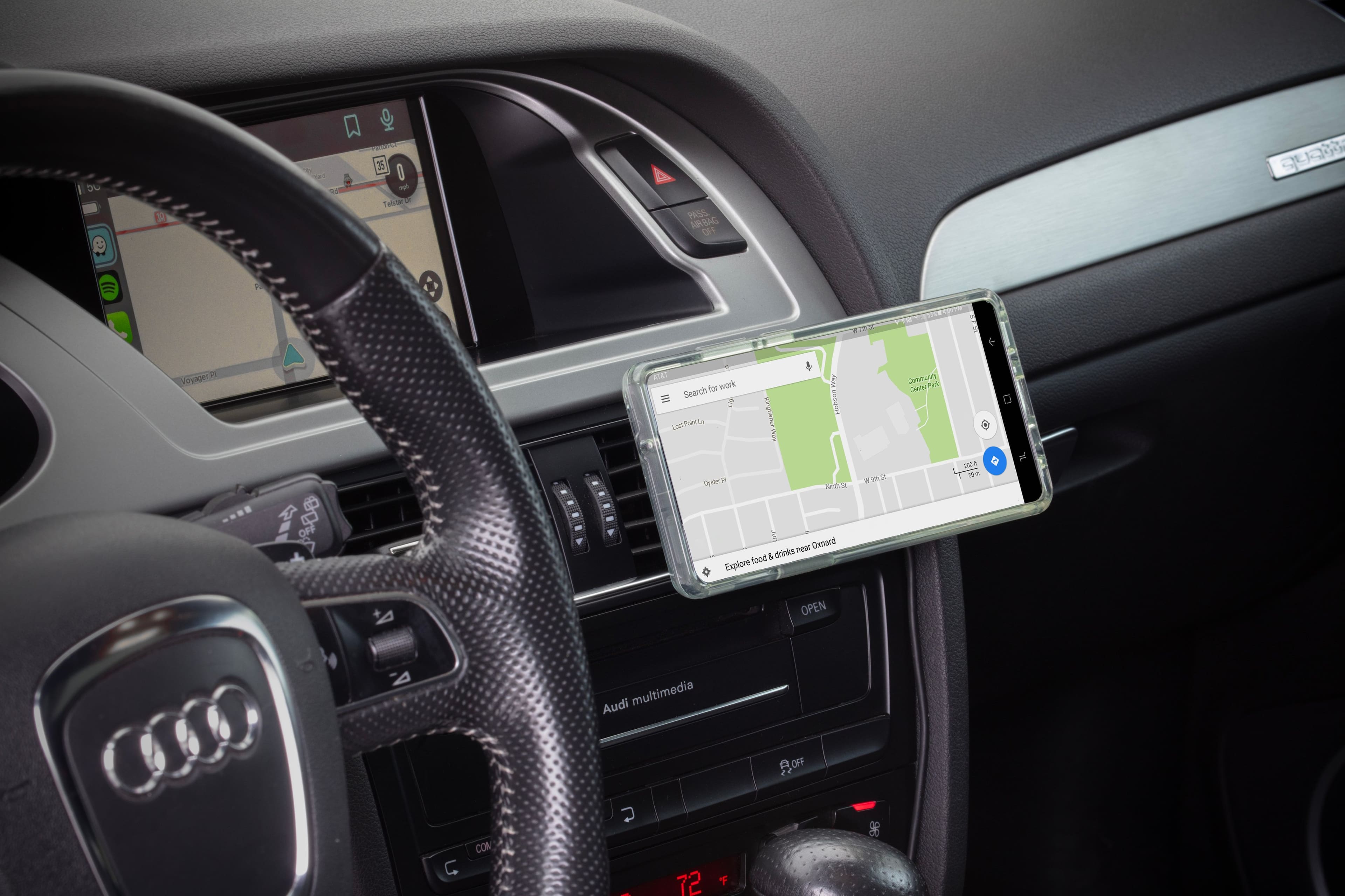 The text on the image reads:
"Sr - I5 O - Talia PROS ARBAG DFF GE F VoyagerP AnL for work Search LongPunLa Port d LAM cnghaler! Fhay VAotenn Community Pak Ceoter Dysier a Nda nea Oxard food & drinks Explore 1 a -. OPEN A Audi multimedia BOFF C CON U | 72 98"
The text is a mix of different phrases and sentences, but it seems to be related to a car, specifically an Audi, and its multimedia system. It might be a description or instructions for using the car's multimedia system, or it could be a reference to a specific model or feature of the car.