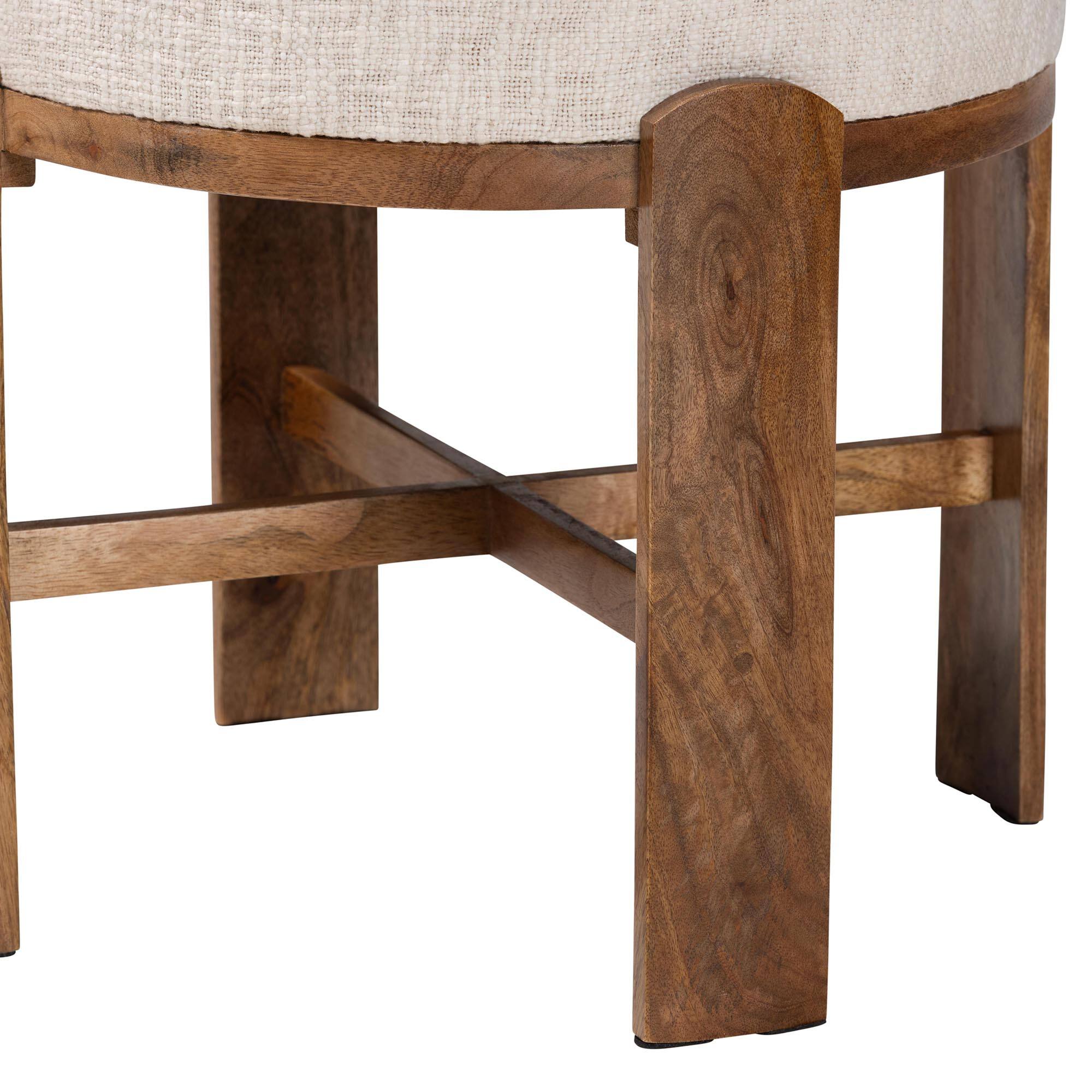Left. Baxton Studio - Whitfield Round Fabric Ottoman Stool - Modern Accent Seating or Footstool with Upholstered Cushion and Mango Wood Frame - Ivory/Walnut Brown.
