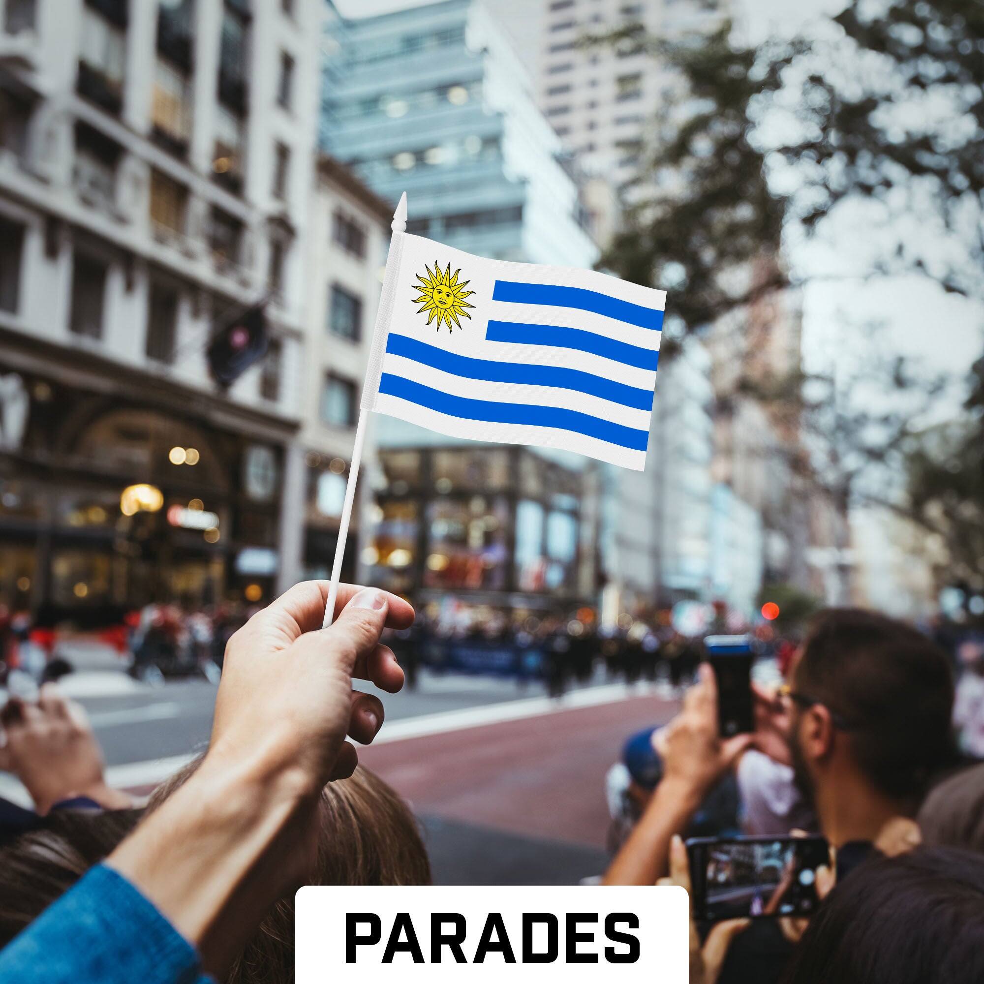 Back. G128 - 24-Pack Handheld Uruguay Stick Flags - 4 x 6 in Printed 150D Polyester, Plastic Stick with Spear Tip. - Assorted Colors.