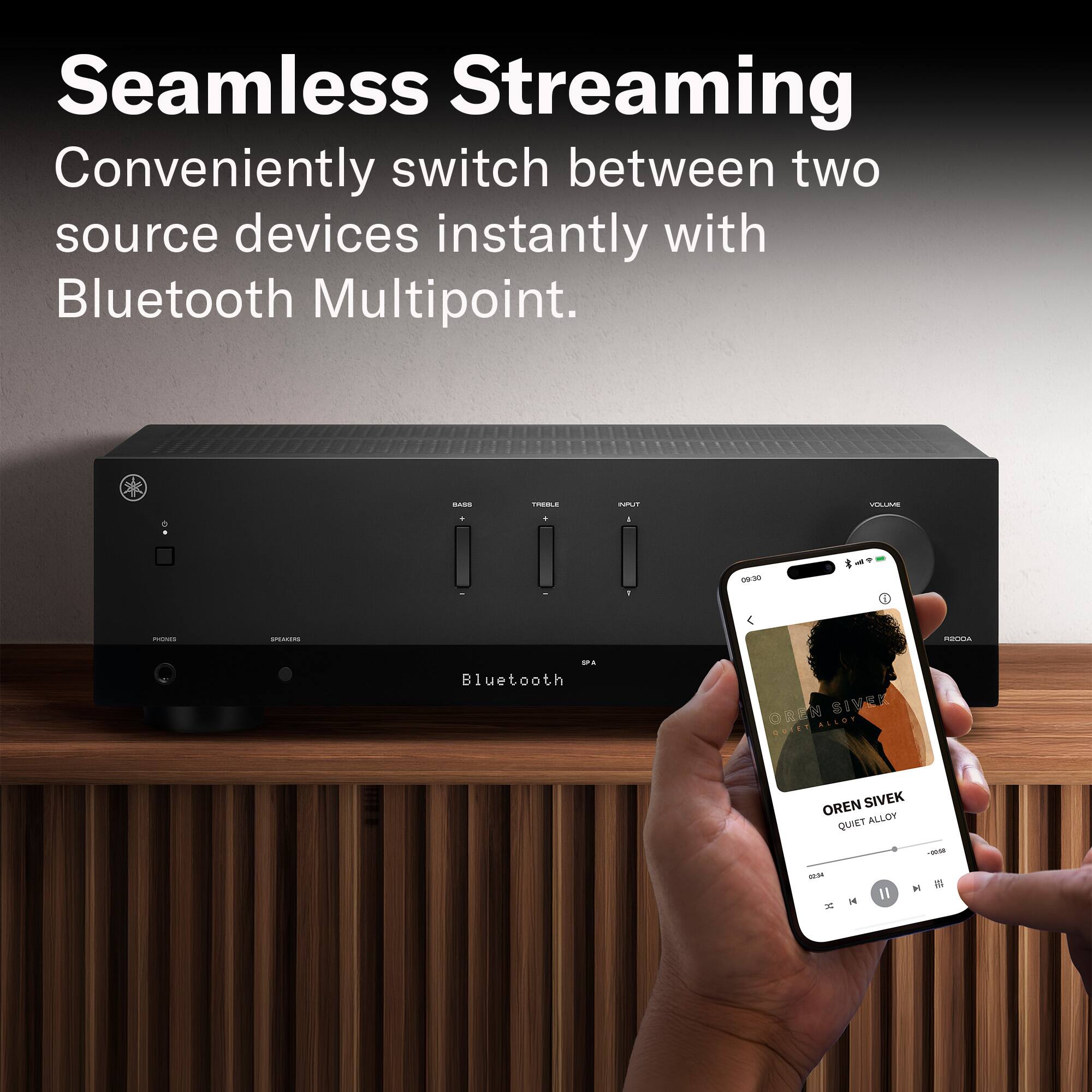 Seamless Streaming  
Conveniently switch between two source devices instantly with Bluetooth Multipoint.

BASS  
TREBLE  
INPUT  
VOLUME

1  
09:30  
FIOMS  
SPEAKERS  
R200A  
IPA Bluetooth  
OREN SIVEK QUIET ALLOY  
02:24