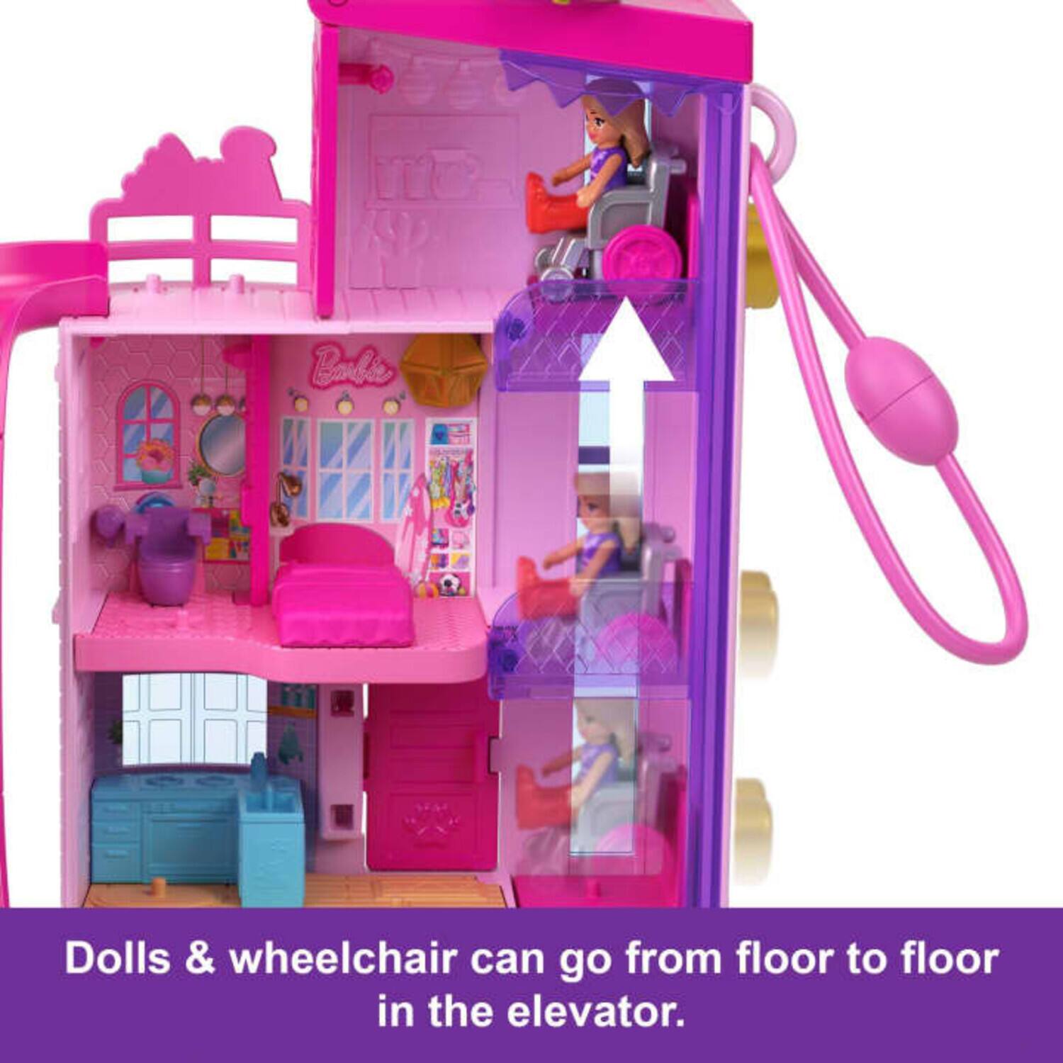 Dolls & wheelchair can go from floor to floor in the elevator.
