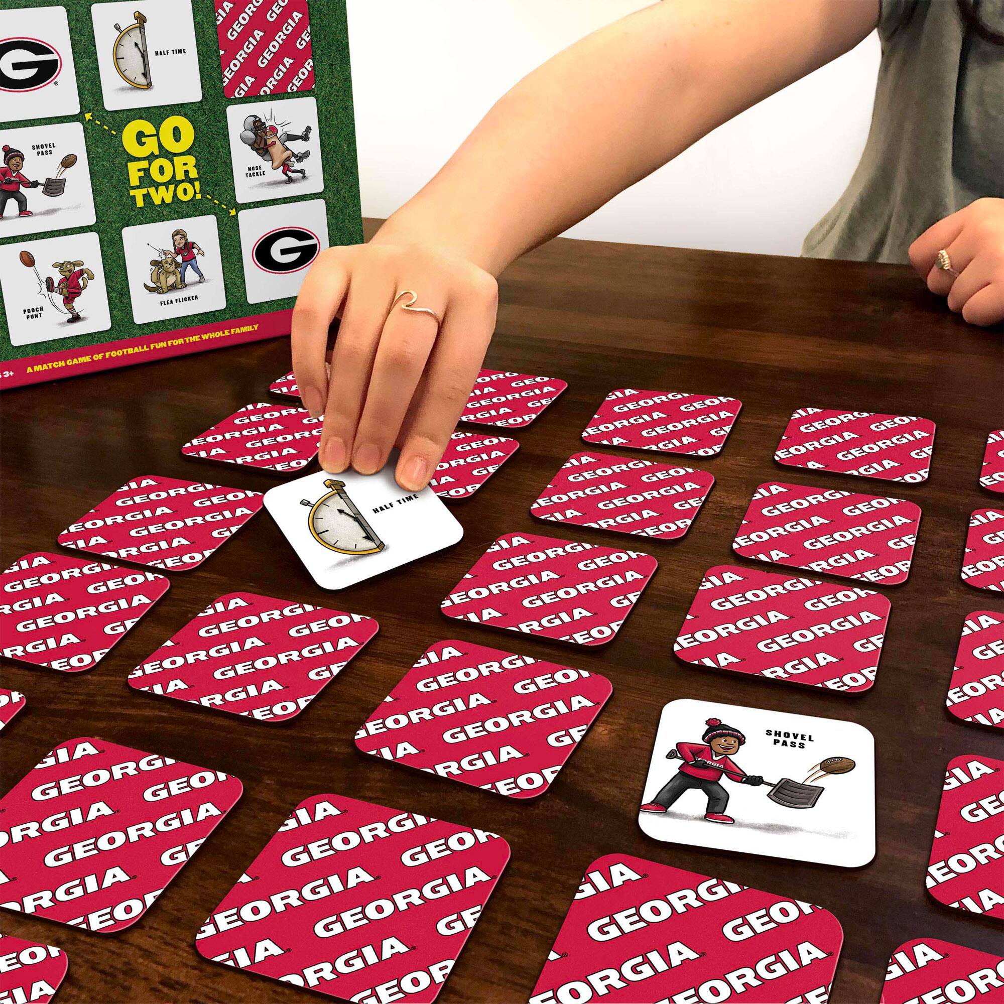 Sure, here is the corrected and grouped text from the image:

**Top Left Card:**
- GO FOR TWO!

**Top Right Card:**
- A MATCH GAME OF FOOTBALL FOR THE WHOLE FAMILY

**Bottom Left Card:**
- SHOVEL PASS

**Bottom Right Card:**
- HAIL TIME

**Red Cards:**
- GEORGIA
- GEORGIA
- GEORGIA
- GEORGIA
- GEORGIA
- GEORGIA
- GEORGIA
- GEORGIA
- GEORGIA
- GEORGIA
- GEORGIA
- GEORGIA
- GEORGIA
- GEORGIA
- GEORGIA
- GEORGIA
- GEORGIA
- GEORGIA
- GEORGIA
- GEORGIA
- GEORGIA
- GEORGIA
- GEORGIA
- GEORGIA
- GEORGIA
- GEORGIA
- GEORGIA
- GEORGIA
- GEORGIA
- GEORGIA
- GEORGIA
- GEORGIA
- GEORGIA
- GEORGIA
- GEORGIA
- GEORGIA
- GEORGIA
