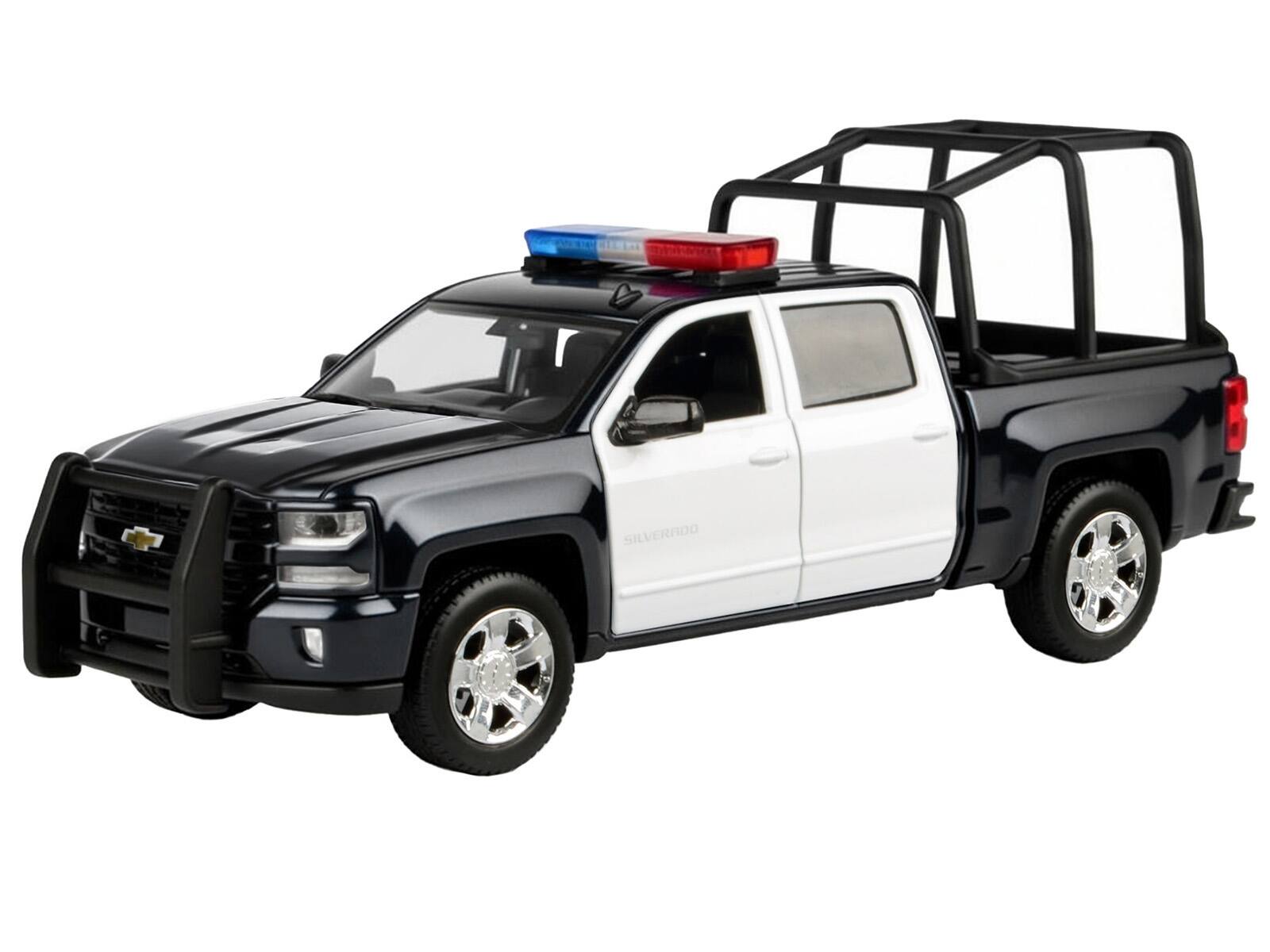 Alt View 1. Motormax - 2017 Chevrolet Silverado 1500 LT Z71 Crew Cab Truck w/Bed Cage Black & White w/Lights & Sounds 1/27 Model Car Motormax.