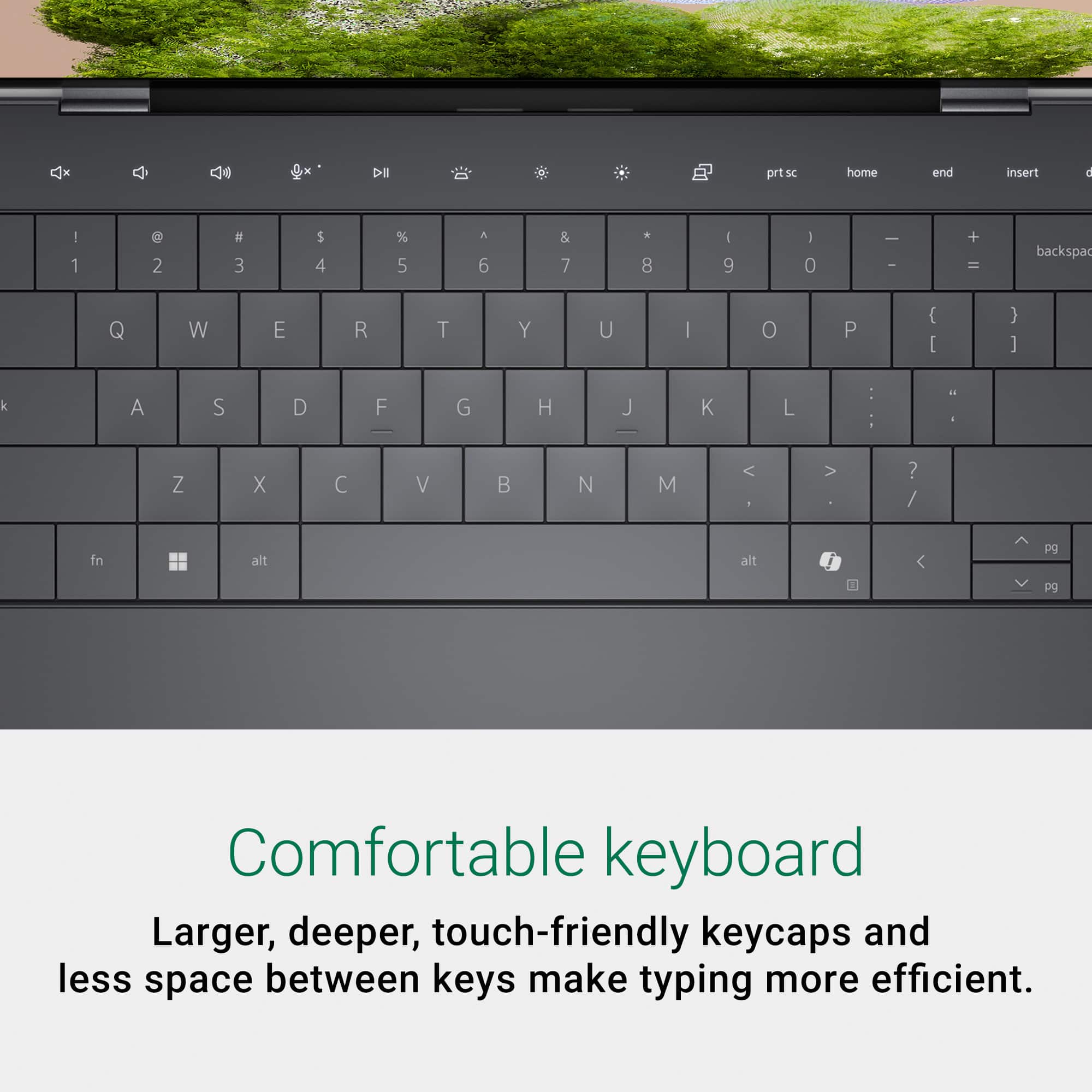 The text on the image reads: "Comfortable keyboard Larger, deeper, touch-friendly keycaps and less space between keys make typing more efficient."