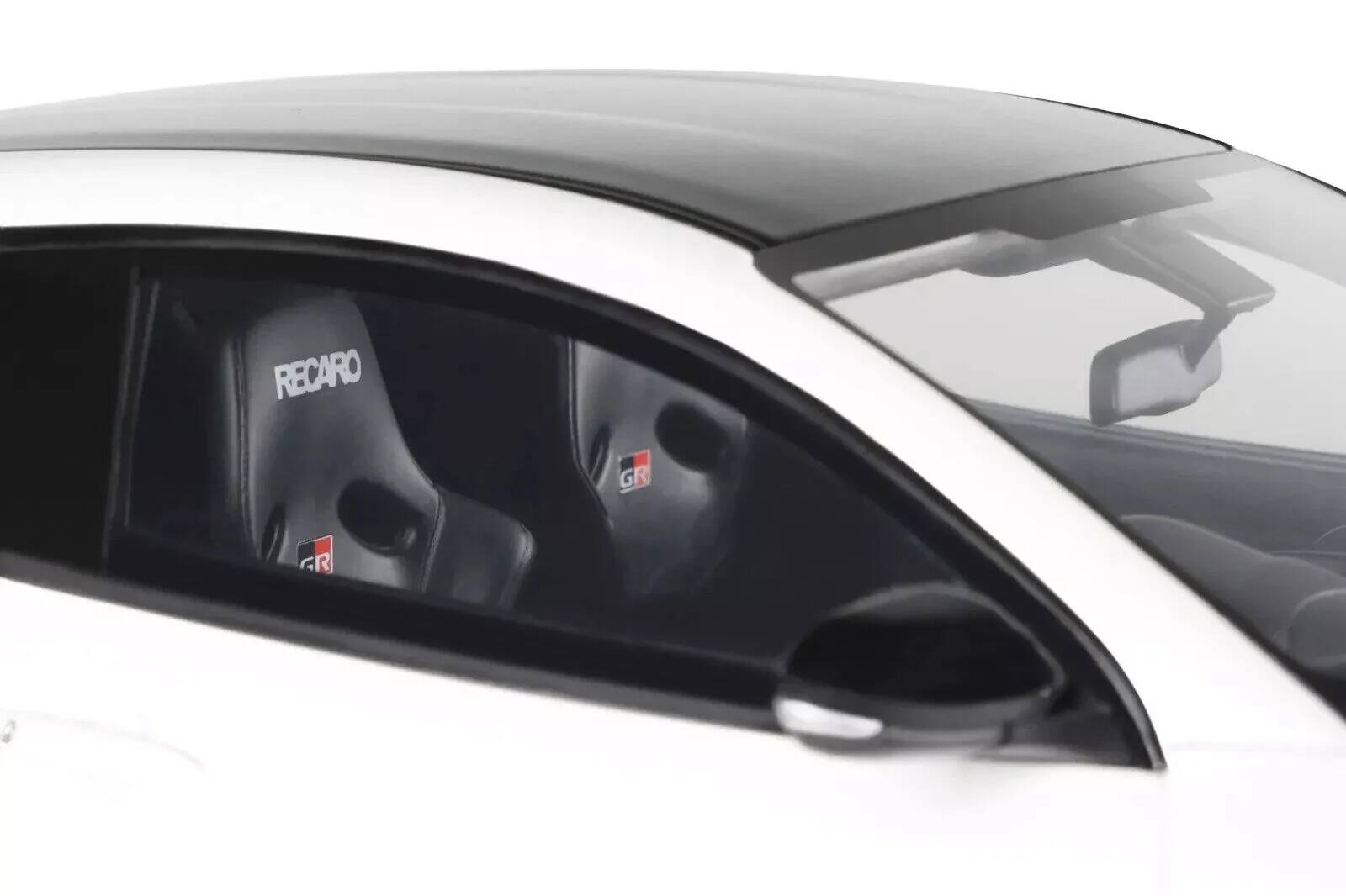 Angle. Otto Mobile - 2022 Toyota GRMN Yaris RHD Platinum White Pearl Black Hood & Top Limited Edition 999 pcs Worldwide 1/18 Scale - White Pearl Black.