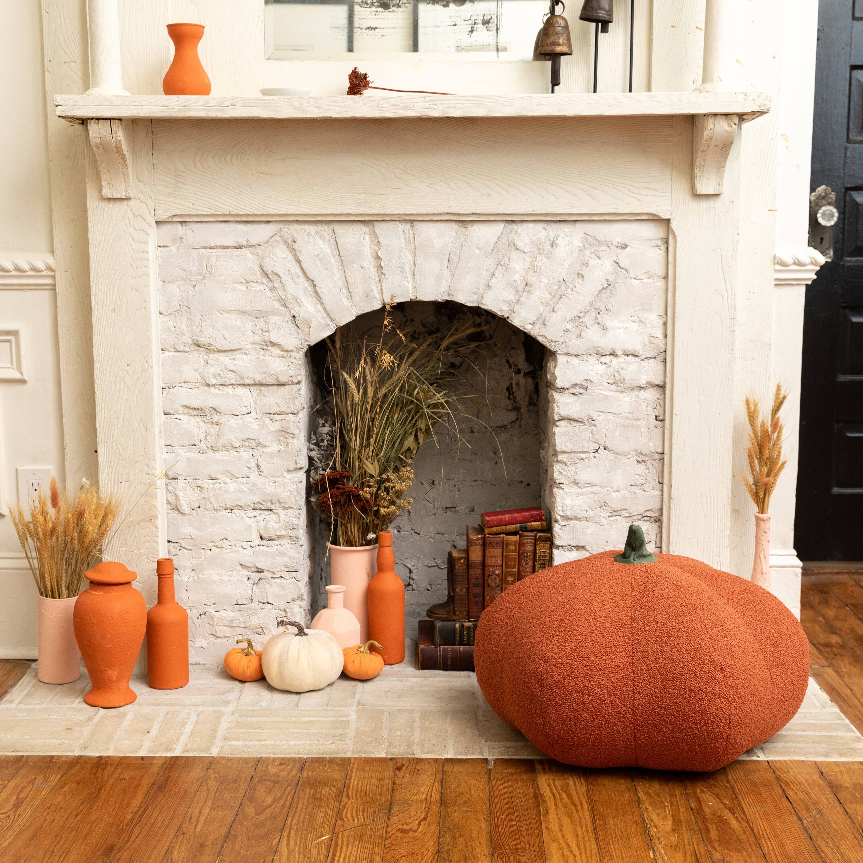 Left. Jaxx - Jaxx Pumpkin Pouf - Luxurious Ottoman for Fall & Halloween Décor - Boucle Terra Cotta - Sunbrella Flax.