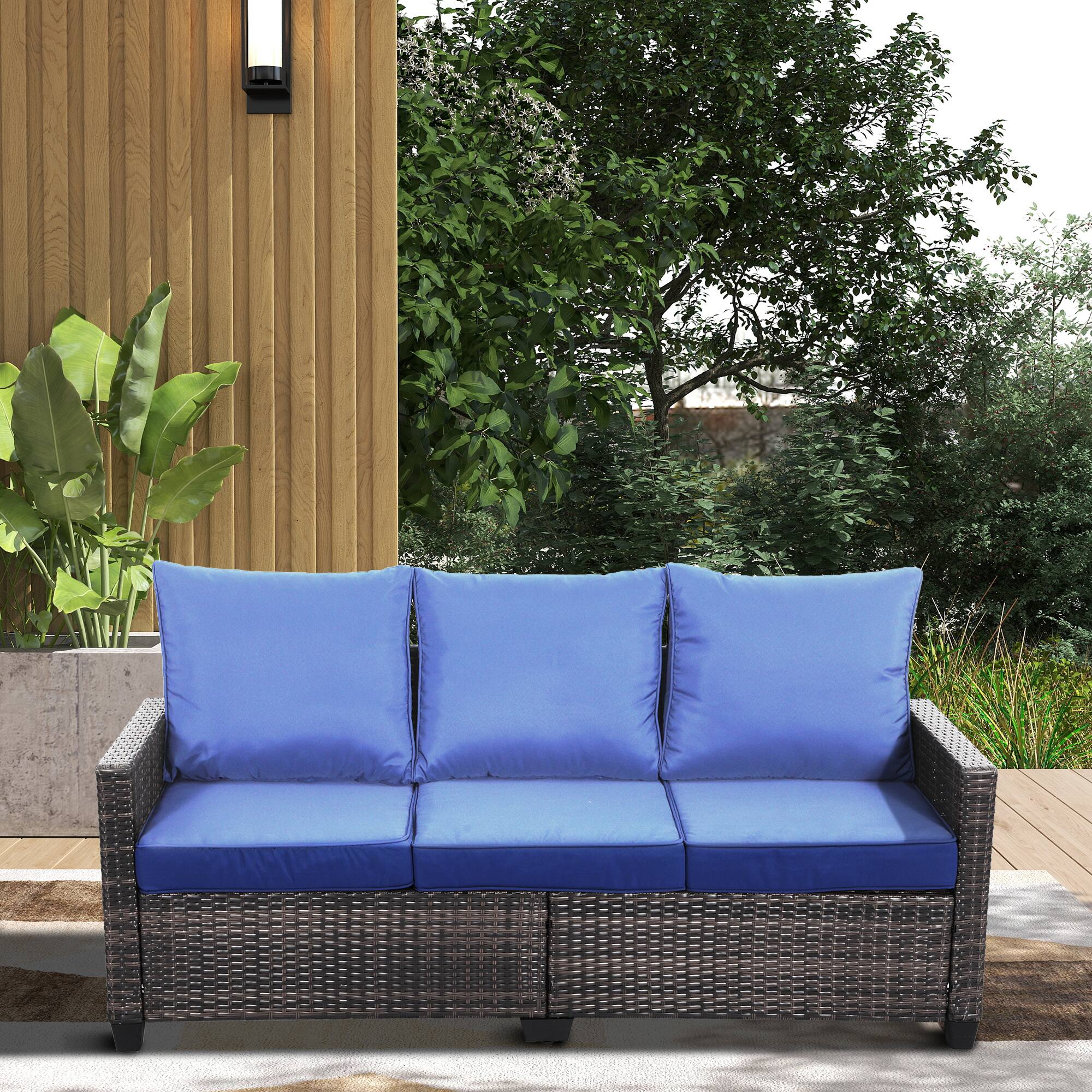 Left. Decksplore - All-weather three-seater wicker patio sofa, premium outdoor furniture featuring brown wickerwork and thickened cushions - Blue.