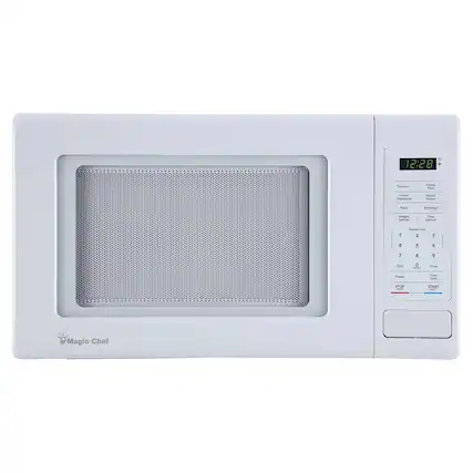 12:28
Popcorn
Dinner
Frozen
Baked
Vegetables
Pizza
Beverage
Weight
Dine
Express Cook
1
2
3
4
5
6
7
8
9
0
Clock
Timer
Power
Cook
STOP
START
Magic Chef