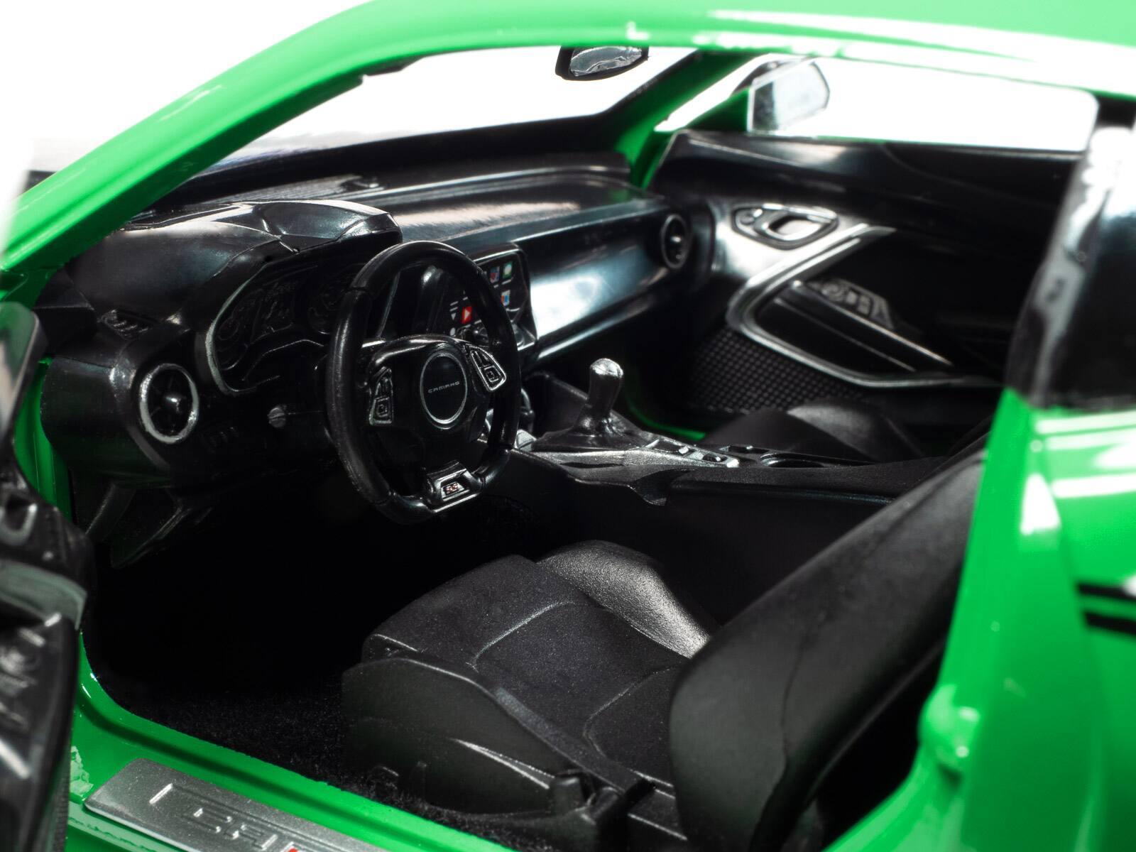 Back. Autoworld - 2017 Chevrolet Nickey Camaro SS 1LE Krypton Green with Matt Black Hood and Black Stripes 1/18 Diecast - Krypton Green.