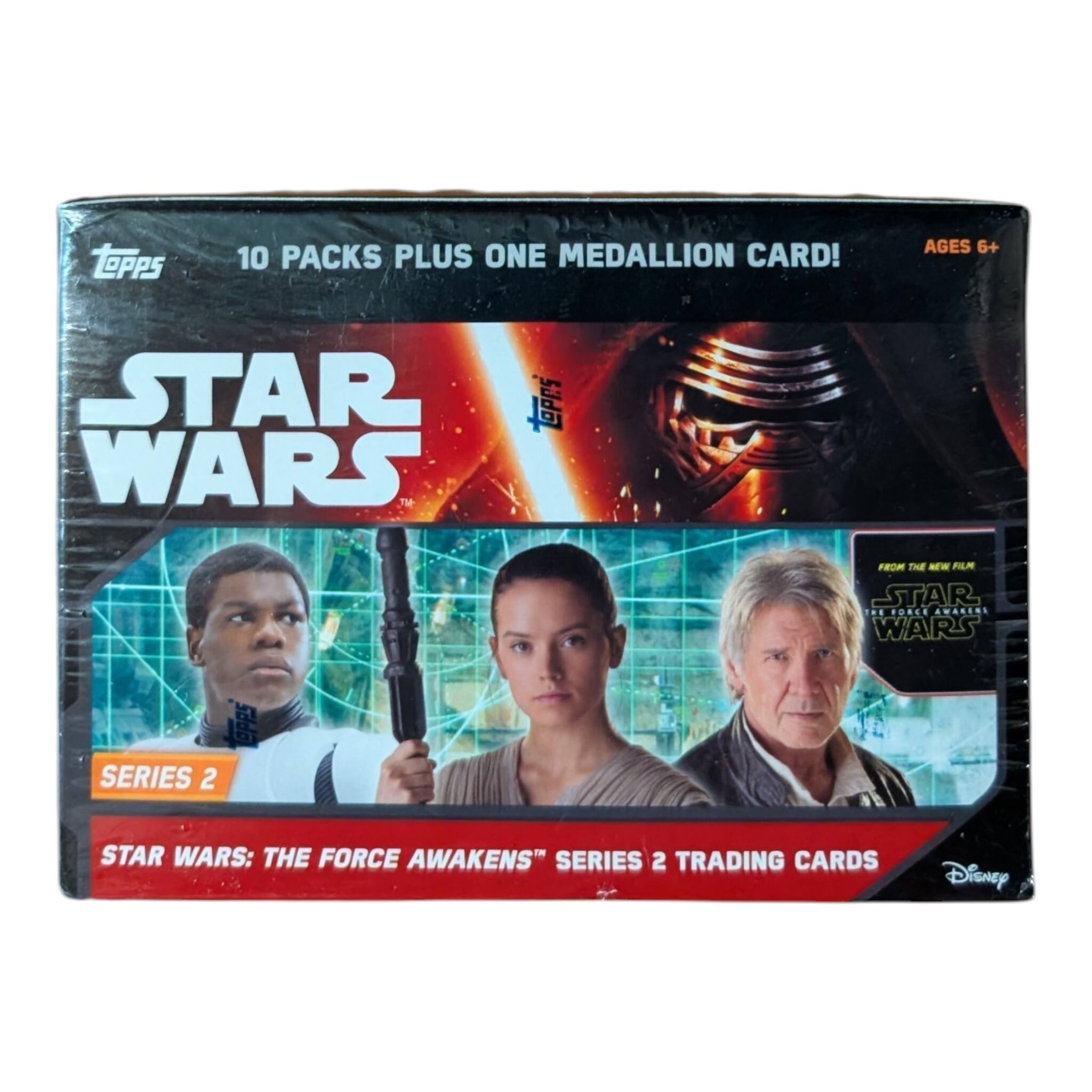 10 PACKS PLUS ONE MEDALLION CARD!  
AGES 6+  
STAR WARS  
SERIES 2  
Topps  
FROM THE NEW FILM STAR WARS: THE FORCE AWAKENS  
STAR WARS: THE FORCE AWAKENS SERIES 2 TRADING CARDS  
Disney