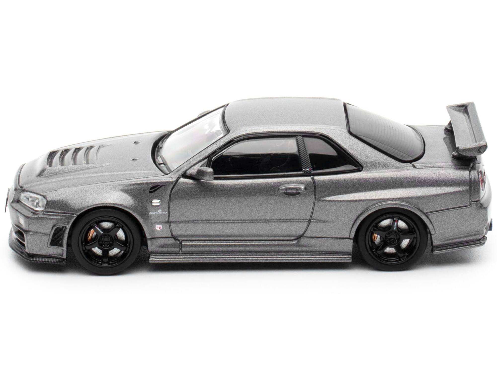 Left. Inno Models - Nissan Skyline GT-R (R34) Z-Tune RHD Gray Metallic "Thailand Diecast Expo 2025 Event Edition" 1/64 - Gray Metallic.