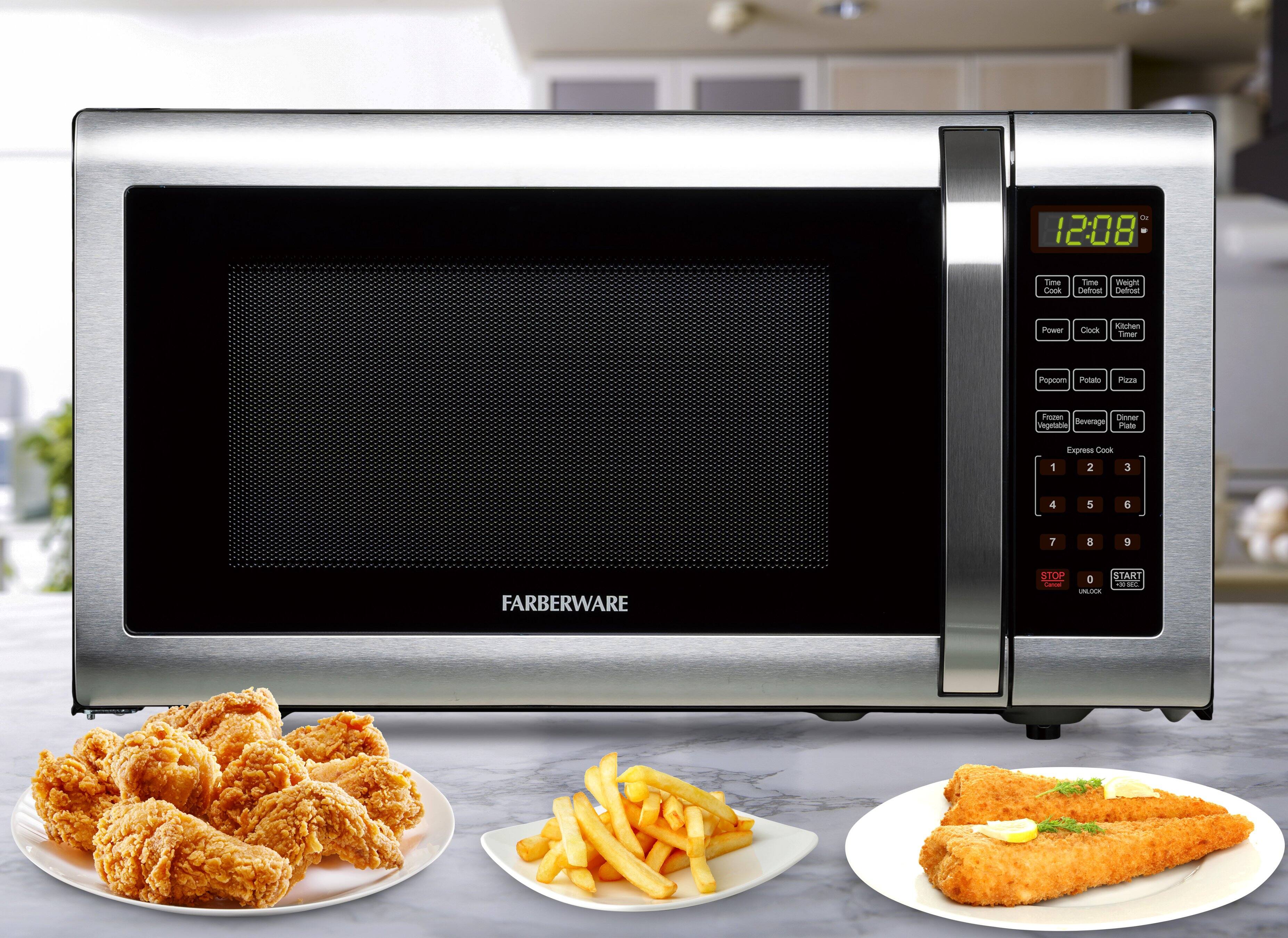 2 12:08 Time Cook Time Defrost Power Clock Kitchen Timer Popcorn Potato Pizza Frozen Vegetable Beverage Dinner Plate Express Cook 1 2 3 4 5 6 7 8 9 FARBERWARE + - START 0 UNLOCK