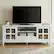 Angle. Simpli Home - Acadian 60W Low TV Stand with Drawers, Glass Doors and Shelves - White.