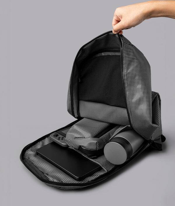 Alt View 3. ALPAKA - Lightweight 22L Laptop Backpack for 16-inch Laptop, Momentum Backpack for Work, Travel & Commuting, Weather-Resistant - Axodyne hybrid Grey.