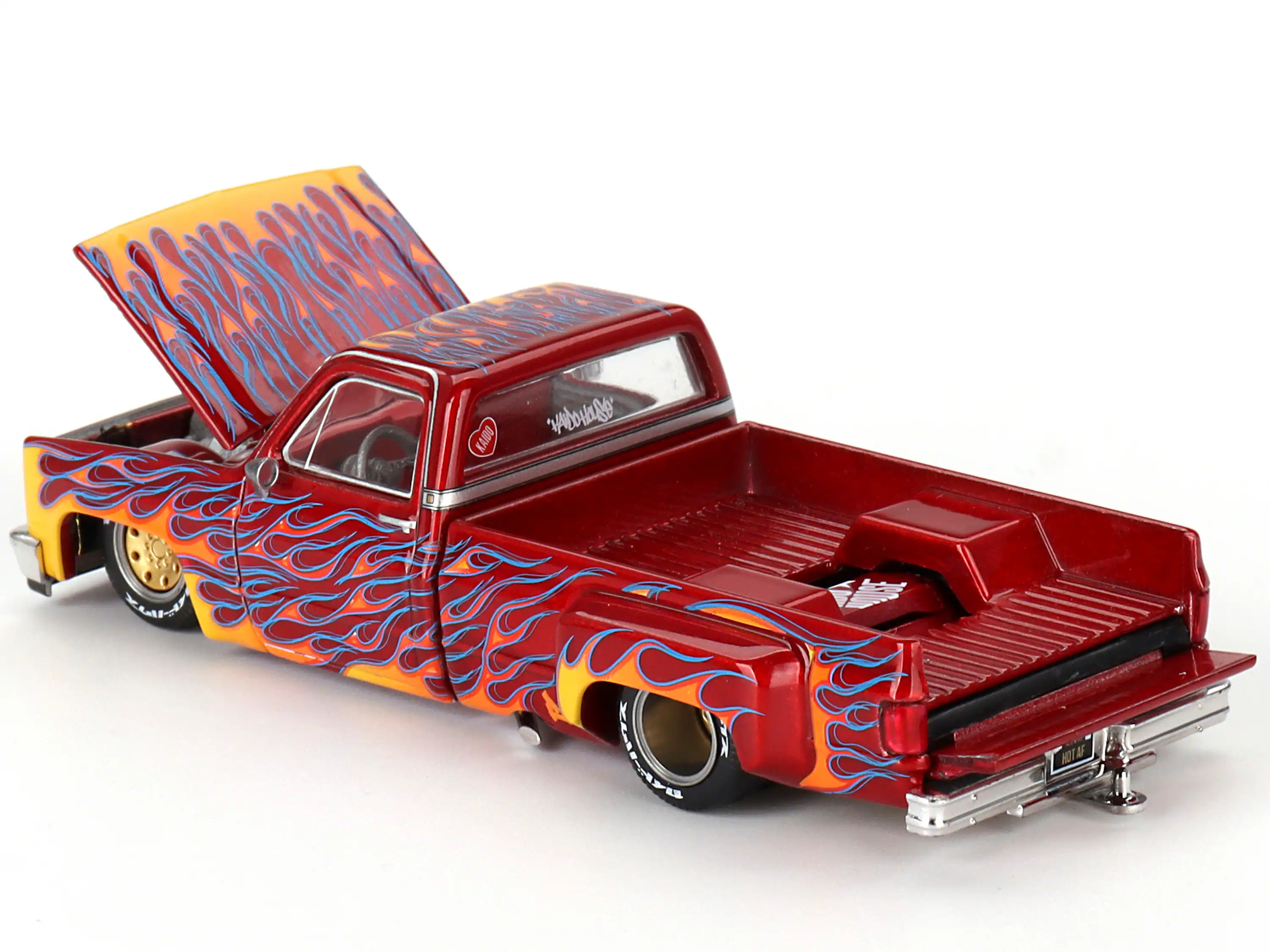 Back. Mini GT - Chevrolet Silverado Dually Pickup On Fire V1 Red Metallic Flames Red Interior Jun Imai Kaido House 1/64 Diecast Mini GT - Red Metallic.