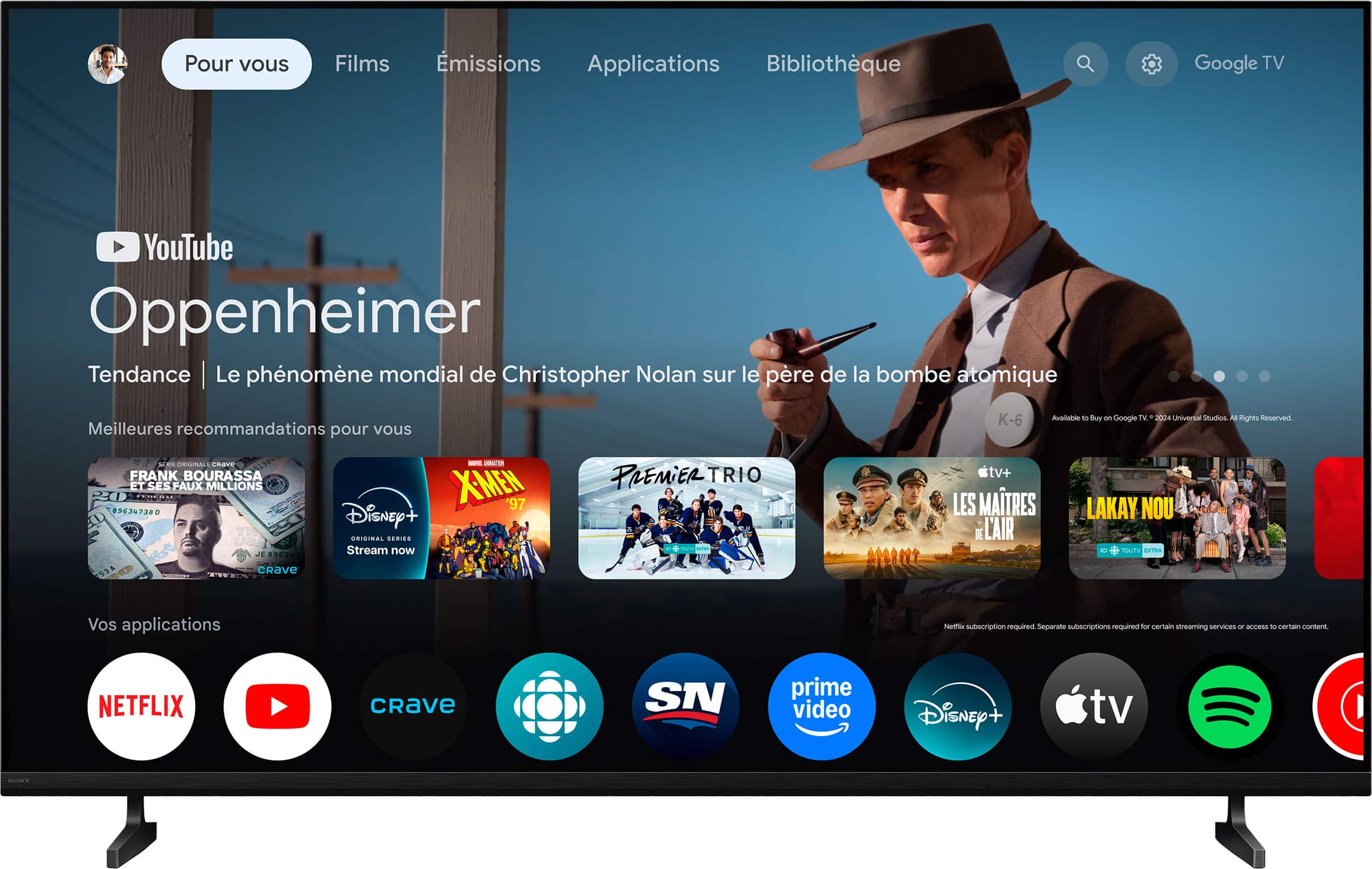 Sure, here is the corrected and grouped text from the image:
---
**Pour vous**
**Films**
**Émissions**
**Applications**
**Bibliothèque**
**YouTube**
**Oppenheimer**
Tendance | Le phénomène mondial de Christopher Nolan sur le père de la bombe atomique
Meilleures recommandations pour vous
**FRANK BOURASSA ET SES FAUX MILLIONS**
X:MEH '97
896347380 7380
**Disney+**
ORIGINAL SERIES
Stream now
**X-MEN**
97
**PREMIER TRIO**
**LES MAÎTRES DE L'AIR**
**LAKAY NOU**
**Vos applications**
**NETFLIX**
**Crave**
**SN**
**prime video**
**Disney+**
**Apple tv**
**Spotify**
**Netflix subscription required. Separate subscriptions required for certain streaming services or access to certain content.**
**Available to Buy on Google TV**
© 2024 Universal Studios. All Rights Reserved.
---
This text is organized to reflect the layout and content of the image.