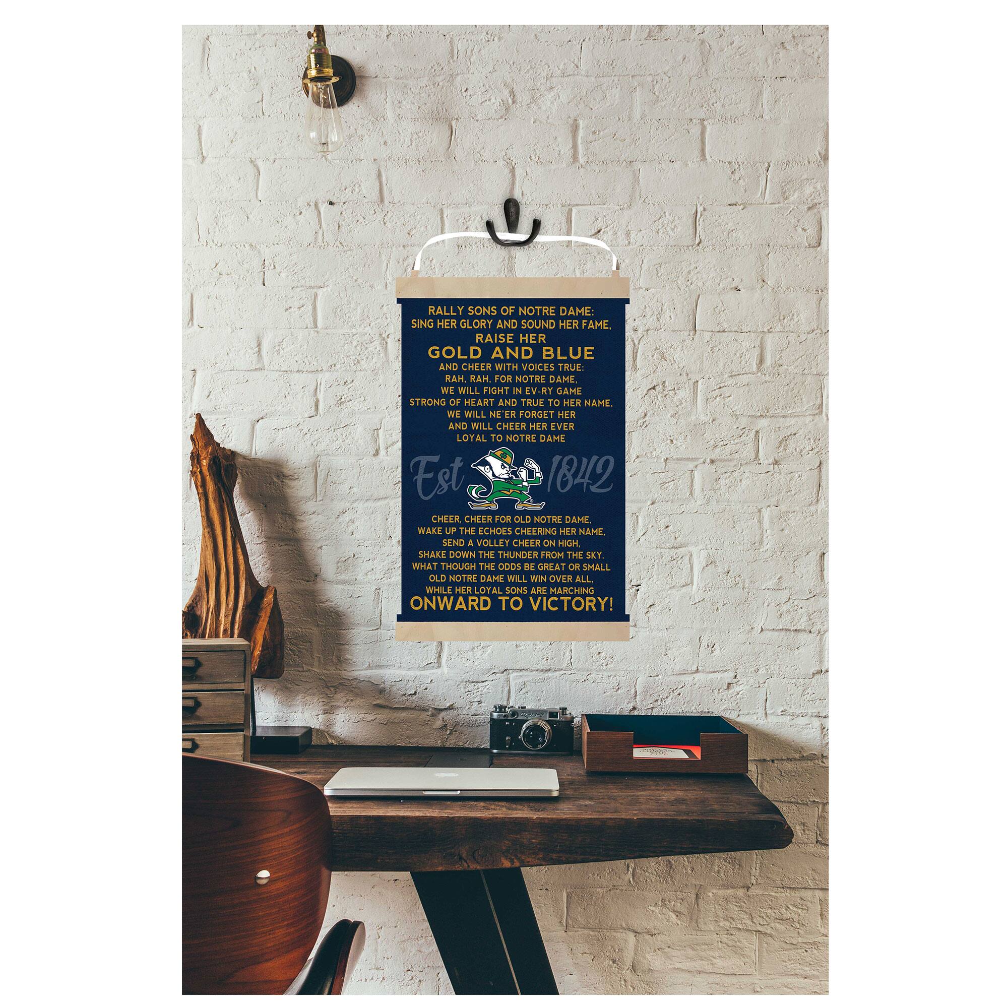 RALLY SONS OF NOTRE DAME:  
SING HER GLORY AND SOUND HER FAME.  
RAISE HER GOLD AND BLUE AND CHEER WITH VOICES TRUE.  
RAM FOR NOTRE DAME STRONG OF HEART AND TRUE TO HER NAME WE WILL FIGHT IN EVERY GAME.  
WE WILL NEVER FORGET HER NAME.  
WE WILL CHEER HER LOYAL TO NOTRE DAME EST 1842.  

CHEER, CHEER FOR OLD NOTRE DAME.  
WAKE UP THE ECHOES CHEERING HER NAME.  
SEND A VOLLEY CHEER ON HIGH.  
SHAKE DOWN THE THUNDER FROM THE SKY.  
WHAT THOUGH THE ODDS ARE GREAT OR SMALL,  
OLD NOTRE DAME WILL WIN OVER ALL.  
WHILE HER LOYAL SONS ARE MARCHING ONWARD TO VICTORY!  

ONWARD TO VICTORY!