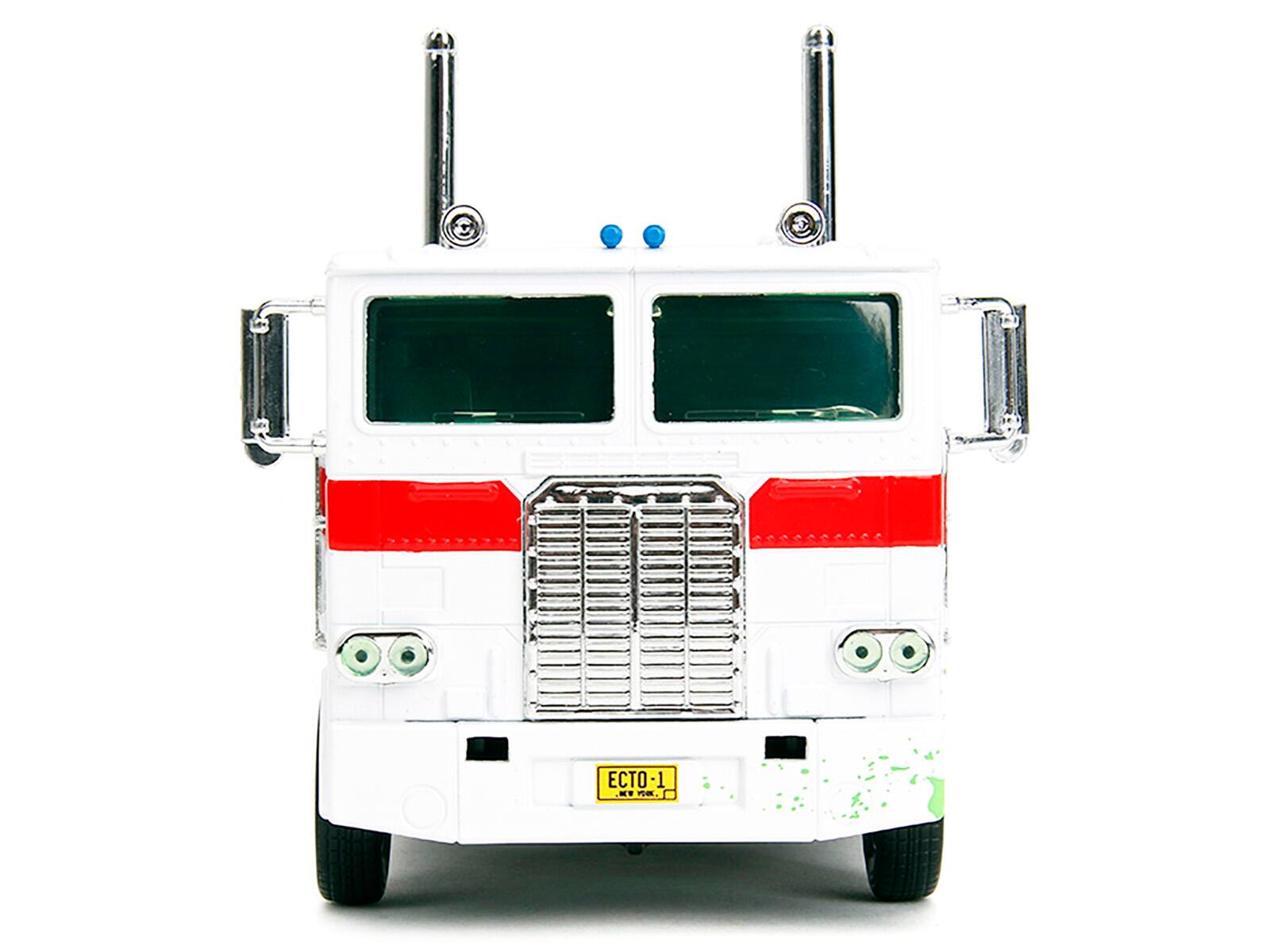 Left. Jada - G1 Autobot Optimus Prime Truck White with Robot Chassis Transformers TV Series Ghostbusters 1984 Movie 1/24 Rides - White .