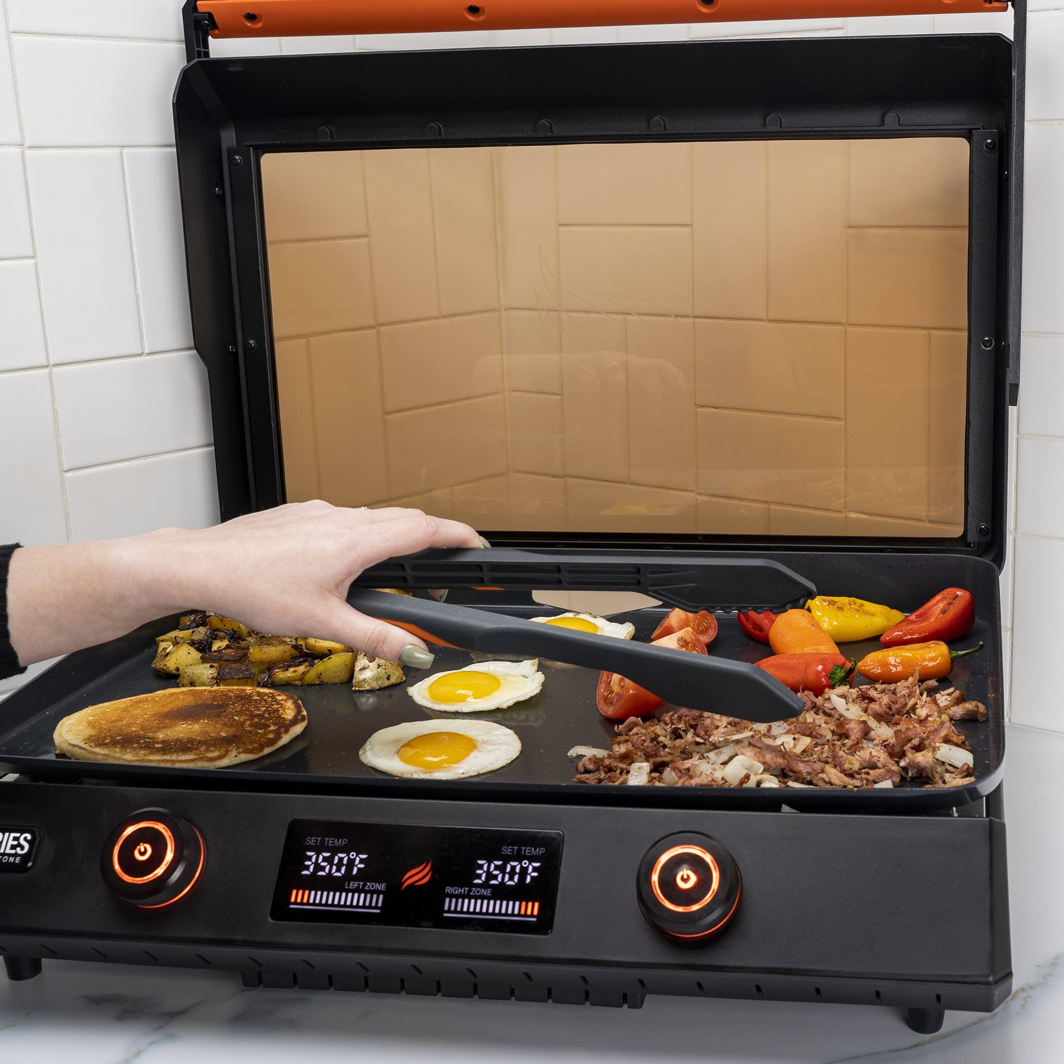 The text on the image reads "ES ON SE7 TEMP 350F LEFT ZONE SET TEMP 350F RGHT ZONE." This text is likely related to the settings of a cooking appliance, such as a toaster oven or a microwave. The first part of the text, "ES ON SE7," might indicate that the appliance is turned on and set to cook at a specific temperature. The second part of the text, "LEFT ZONE SET TEMP 350F RGHT ZONE," suggests that the temperature is set to 350 degrees Fahrenheit for both the left and right cooking zones.