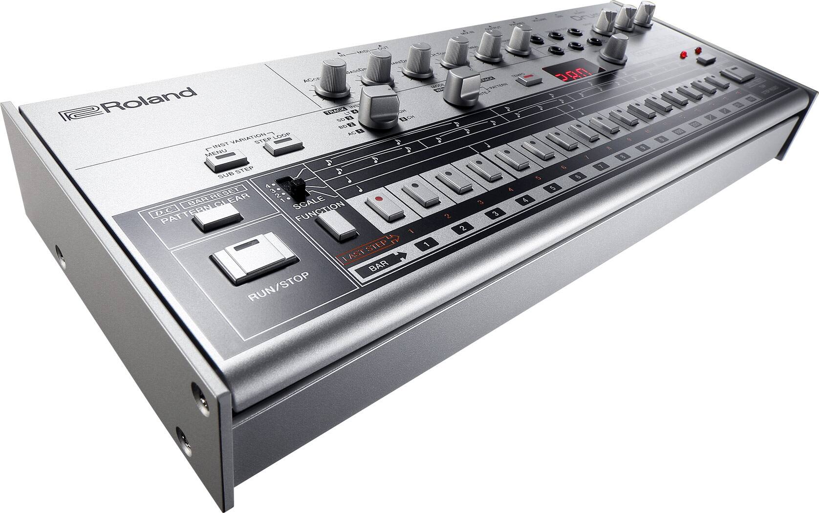 Left. Roland - TR-06 Rhythm Machine.