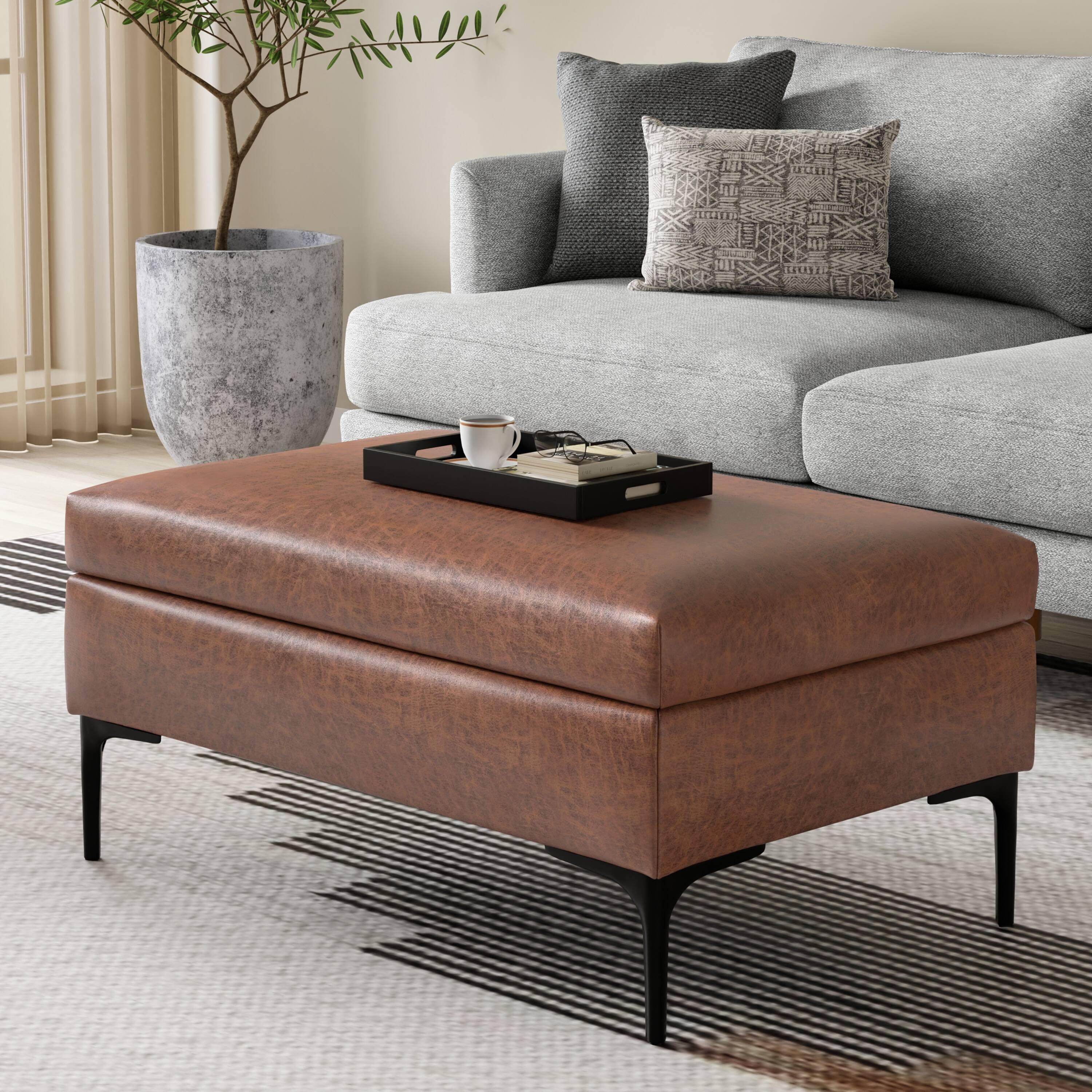 Angle. Simpli Home - Rebecca 36 inch Wide Rectangular Coffee Table Storage Ottoman with Lift Up Lid in Distressed Saddle Brown Vegan Leather - Distressed Saddle Brown.