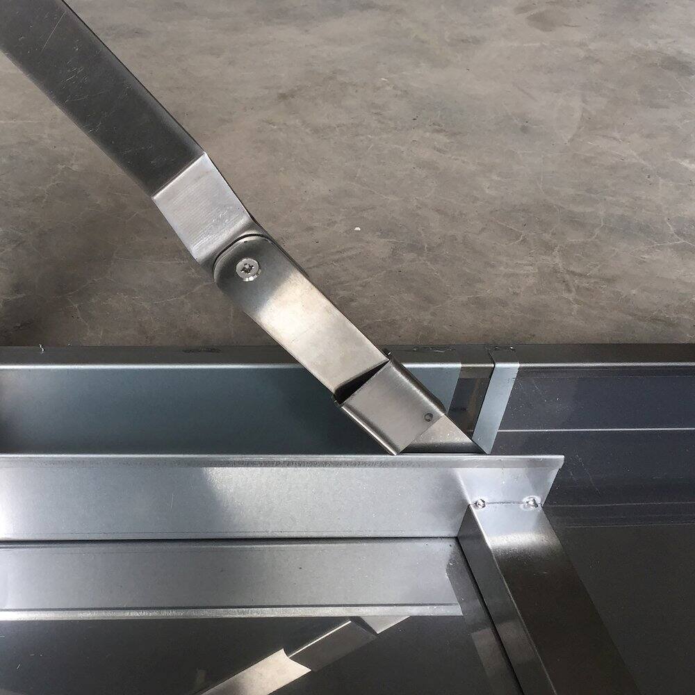 Left. Sportsman Pro-Series - Sportsman Series Stainless Steel Portable Folding Work Table - Silver.