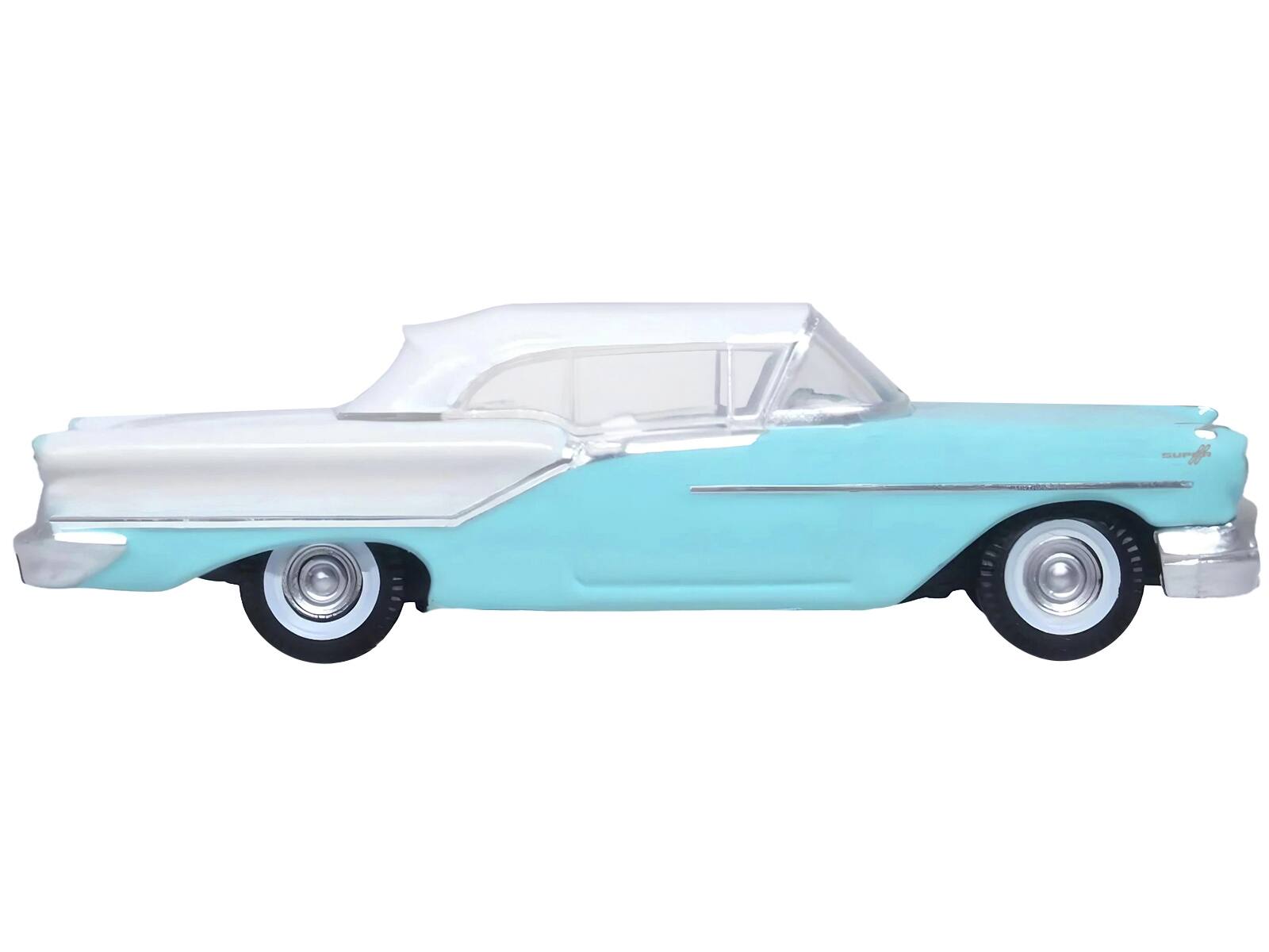Angle. Oxford Diecast - 1957 Oldsmobile 88 Convertible (Top-Up) Banff Blue and Alcan White with White 1/87 (HO) Scale - Blue, White.