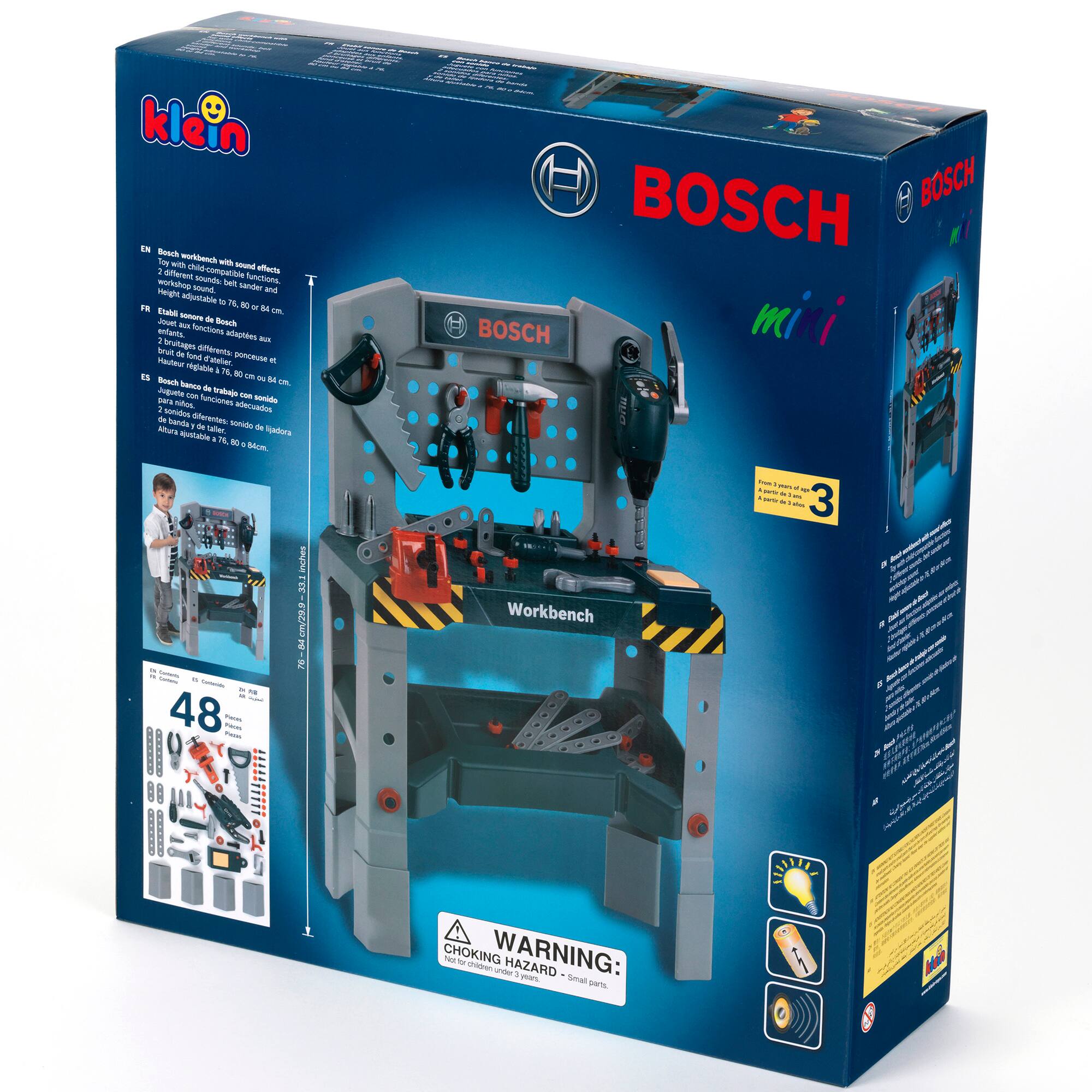 The box contains a Bosch workbench with a vice and a sander. The workbench is designed to be compatible with various Bosch tools, and it comes with a vice and a sander. The box also contains instructions for assembling and using the workbench. The workbench is made of metal and has a blue color. It is designed for use with Bosch tools, and it is compatible with a variety of different tools. The box also includes a warning label, indicating that the workbench may pose a choking hazard.