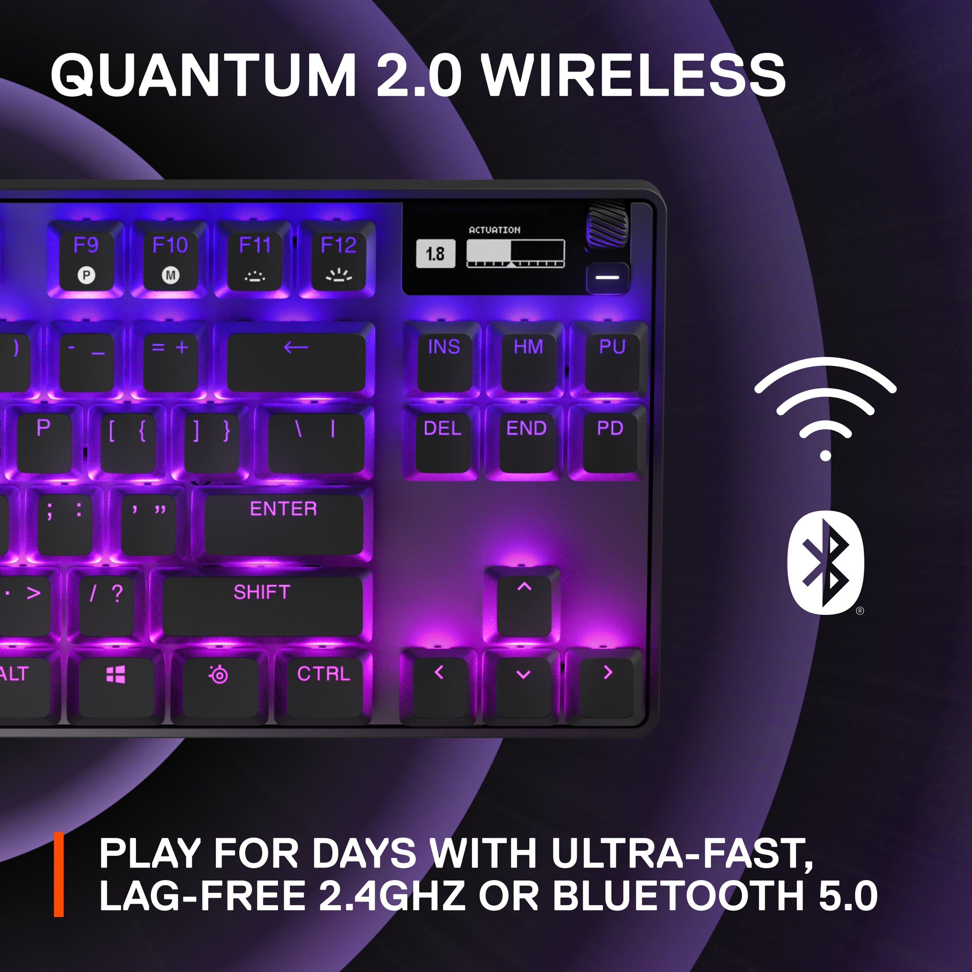 The text on the image is describing a Quantum 2.0 Wireless keyboard, which features a purple color scheme and is designed for use with a 2.4GHz or Bluetooth 5.0 connection. The keyboard has a play for days feature, which suggests that it has a long battery life, allowing users to enjoy gaming or other activities for extended periods without needing to recharge. Additionally, the keyboard is equipped with a lag-free, ultra-fast connection, ensuring smooth and responsive performance.