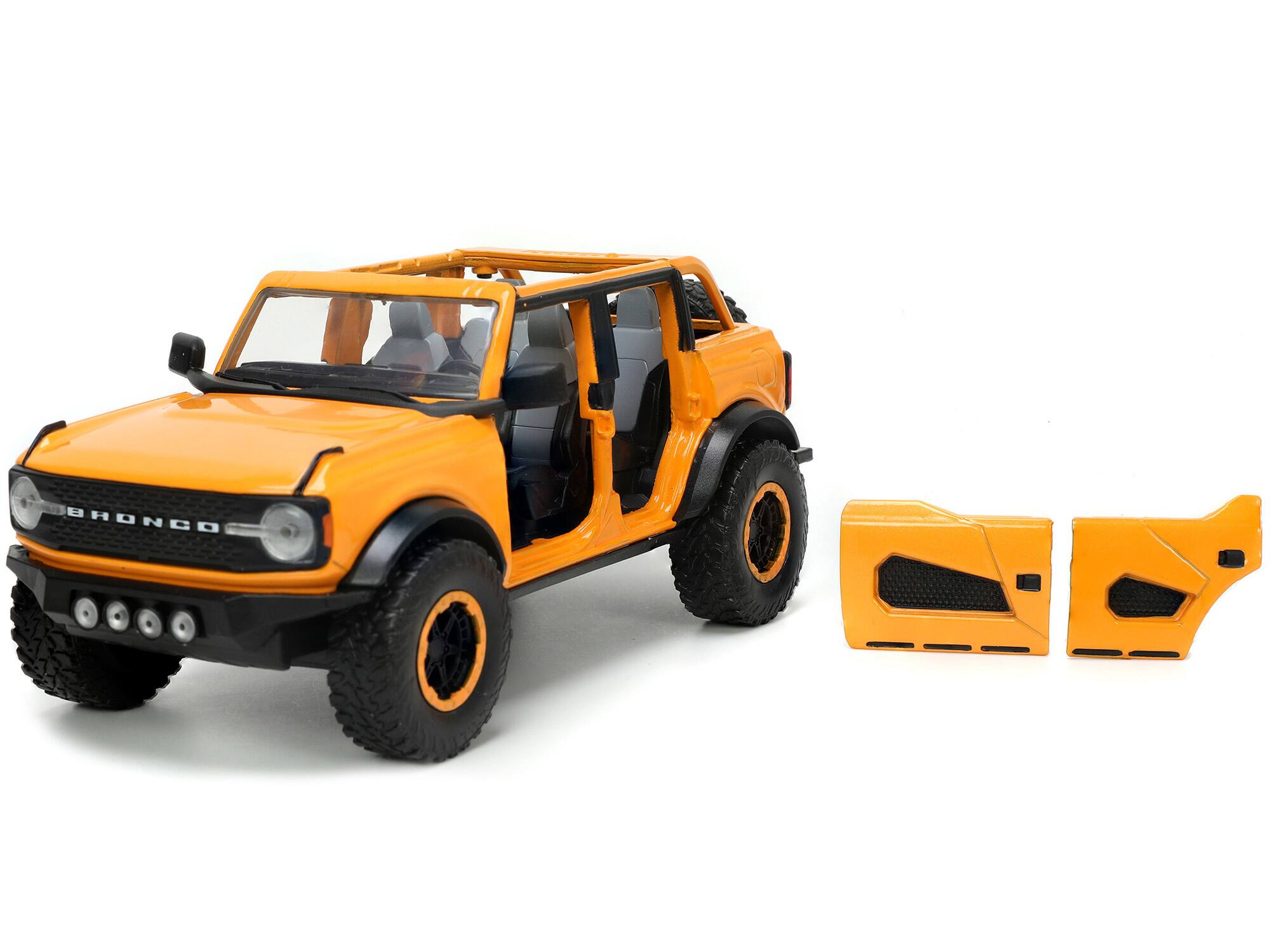 Alt View 1. Jada - 2021 Ford Bronco Orange Metallic with Extra Wheels "Just Trucks" Series 1/24 Diecast Model Car by Jada.