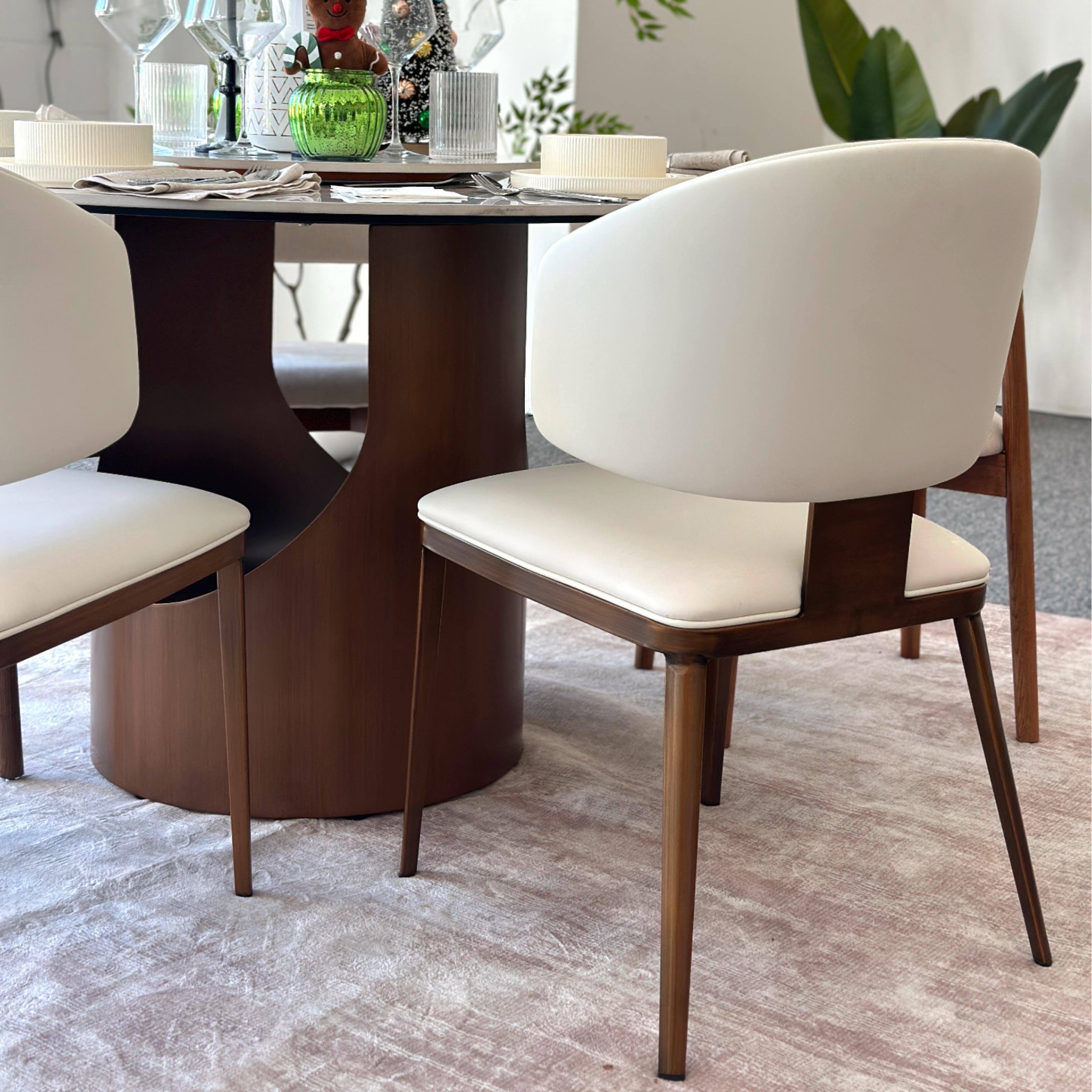 Left. POVISON - Modern Upholstered Dining Chairs Set of 2, Faux Leather Accent Chairs, Side Chairs with Curved Back, Fully Assembled - Beige & Bronze.