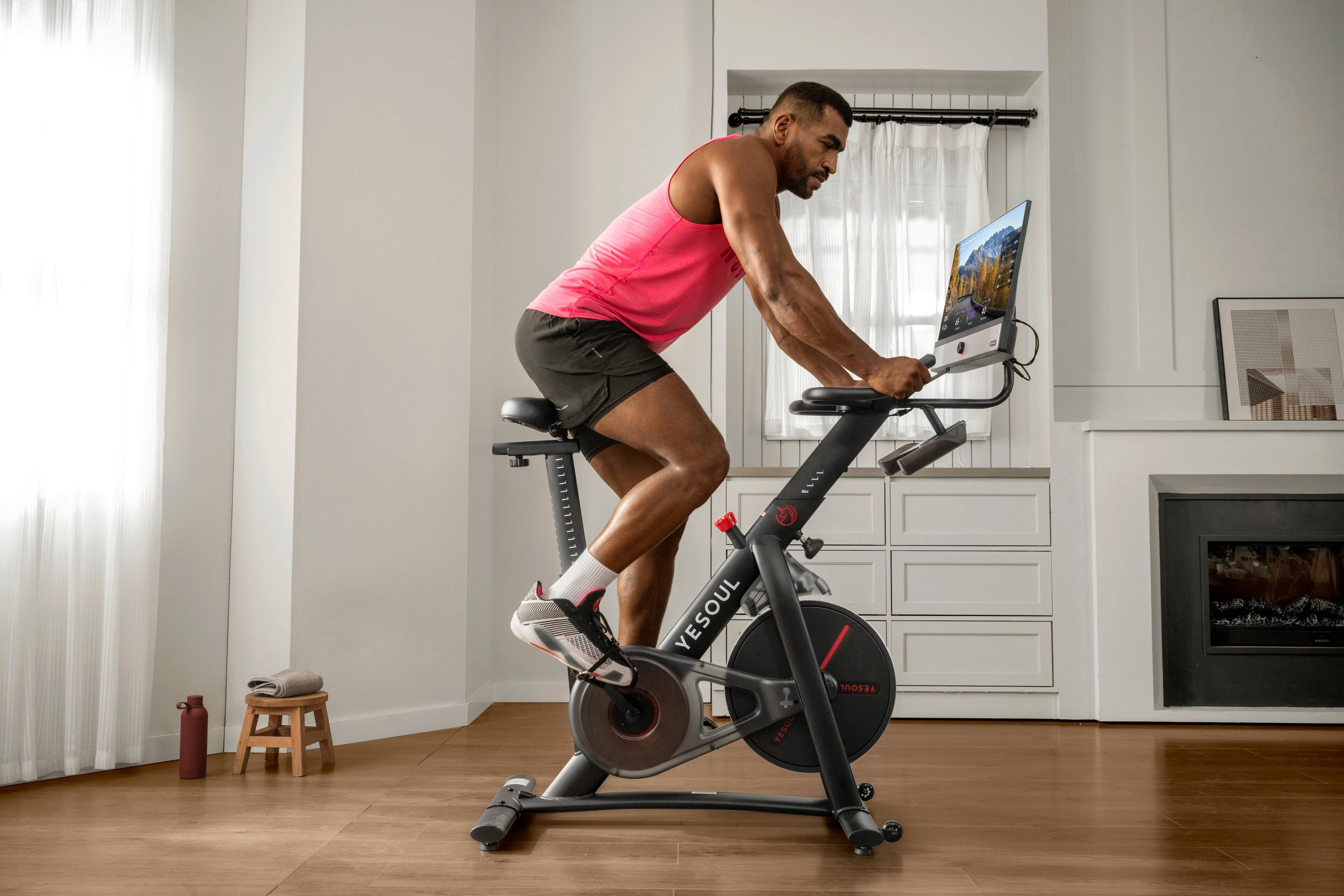 I'm sorry, but the text you provided does not make sense and does not relate to the image. The image shows a man riding an exercise bike in a living room, with a laptop in front of him.