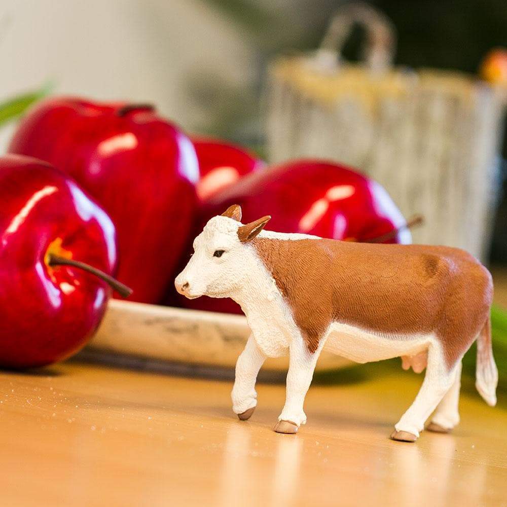 Angle. Safari Ltd. - Hereford Cow Toy Figurine.