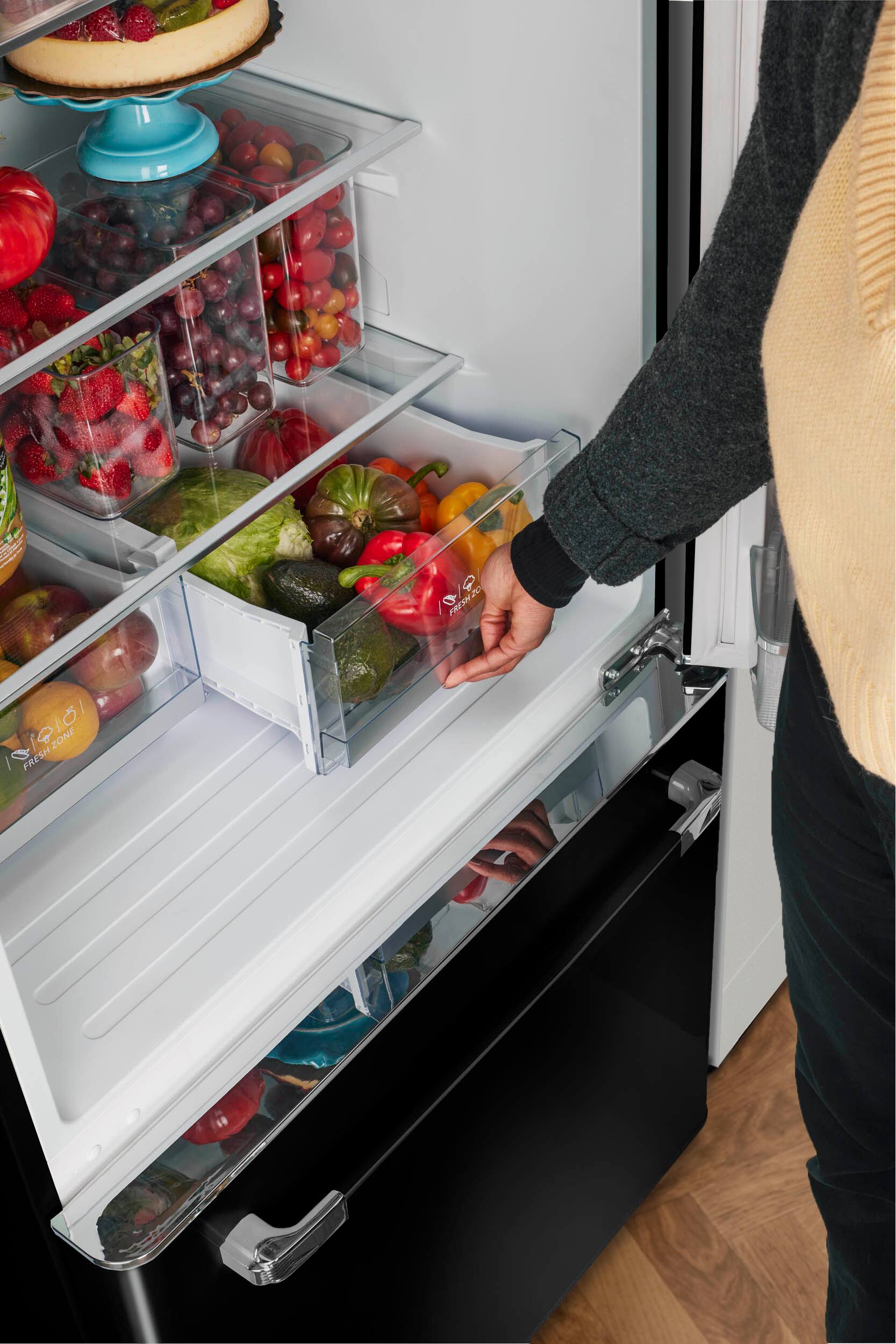 The text "FRESH" is displayed on the refrigerator, indicating that the section is dedicated to fresh produce.