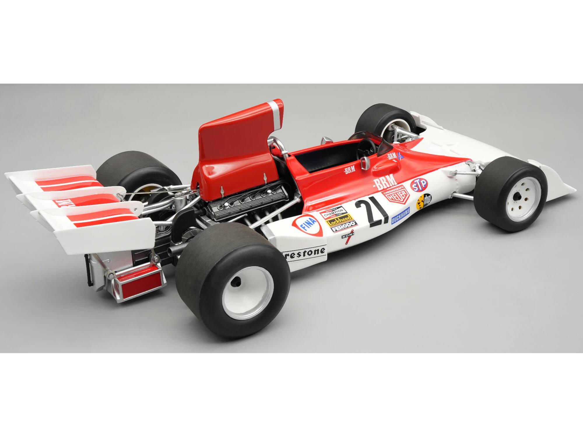 BRM - BRM - BRM  
MANNOPHAGH  
STP  
HEUER  
the FINA CHAMPION  
Lockheed  
FERODO  
21  
DUCKHAMS  
BOOK  
Firestone