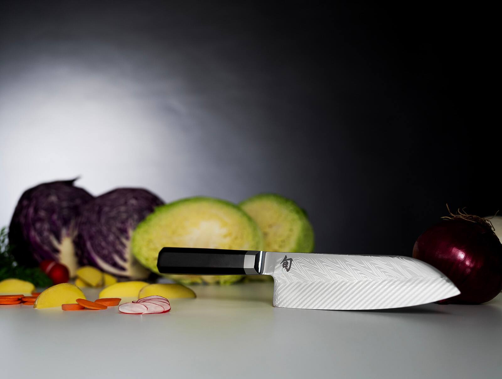 Alt View 2. Shun - Dual Core 7-Inch Santoku Knife w/Saya - Black.