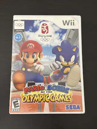The text on the image should be grouped and corrected as follows:
"OFFICIAL VIDEO GAME nintendo Wi-Fi connection Beijing 2008 Wii. MARIO & SONIC AT THE OLYMPIC GAMES™ E SEGA CONTENT RATED BY ESRB"
This is the cover of the game "Mario & Sonic at the Olympic Games" for the Wii console. - E (Everyone)
