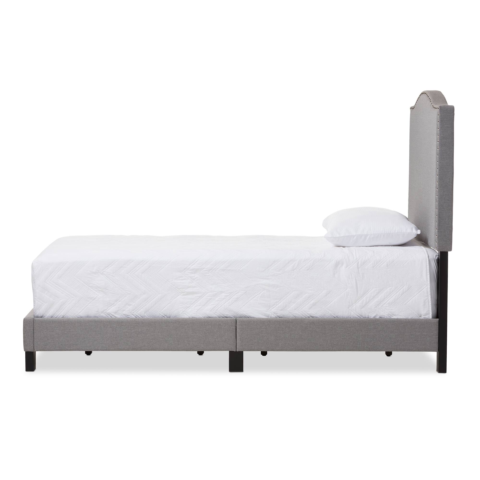 Angle. Baxton Studio - Benjamin Modern and Contemporary Fabric Upholstered Twin Size Arched Bed with Nail Heads - Grey.