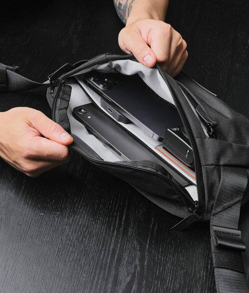 Left. ALPAKA - Sling Bag Bag for Men, Fits iPad Mini & Switch OLED, Hidden Rear Pocket, Magnetic Buckle, YKK AquaGuard Zippers - Black Axoflux 300D.