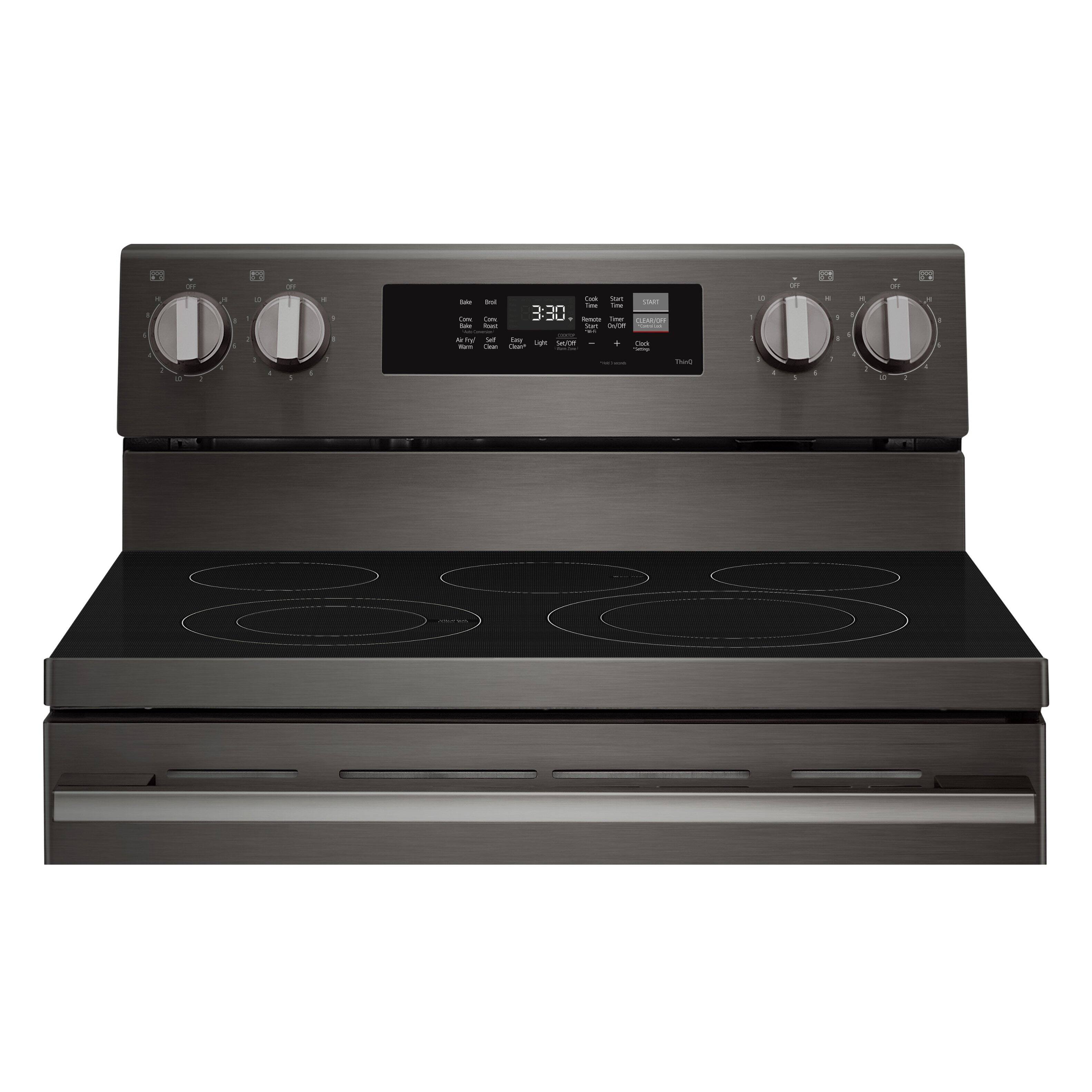 The image shows a stainless steel stove with a digital display showing the time as 3:30. The stove has four burners, and the oven is located below the stovetop. The stove is a modern and sleek design, likely offering advanced features and functions for cooking.